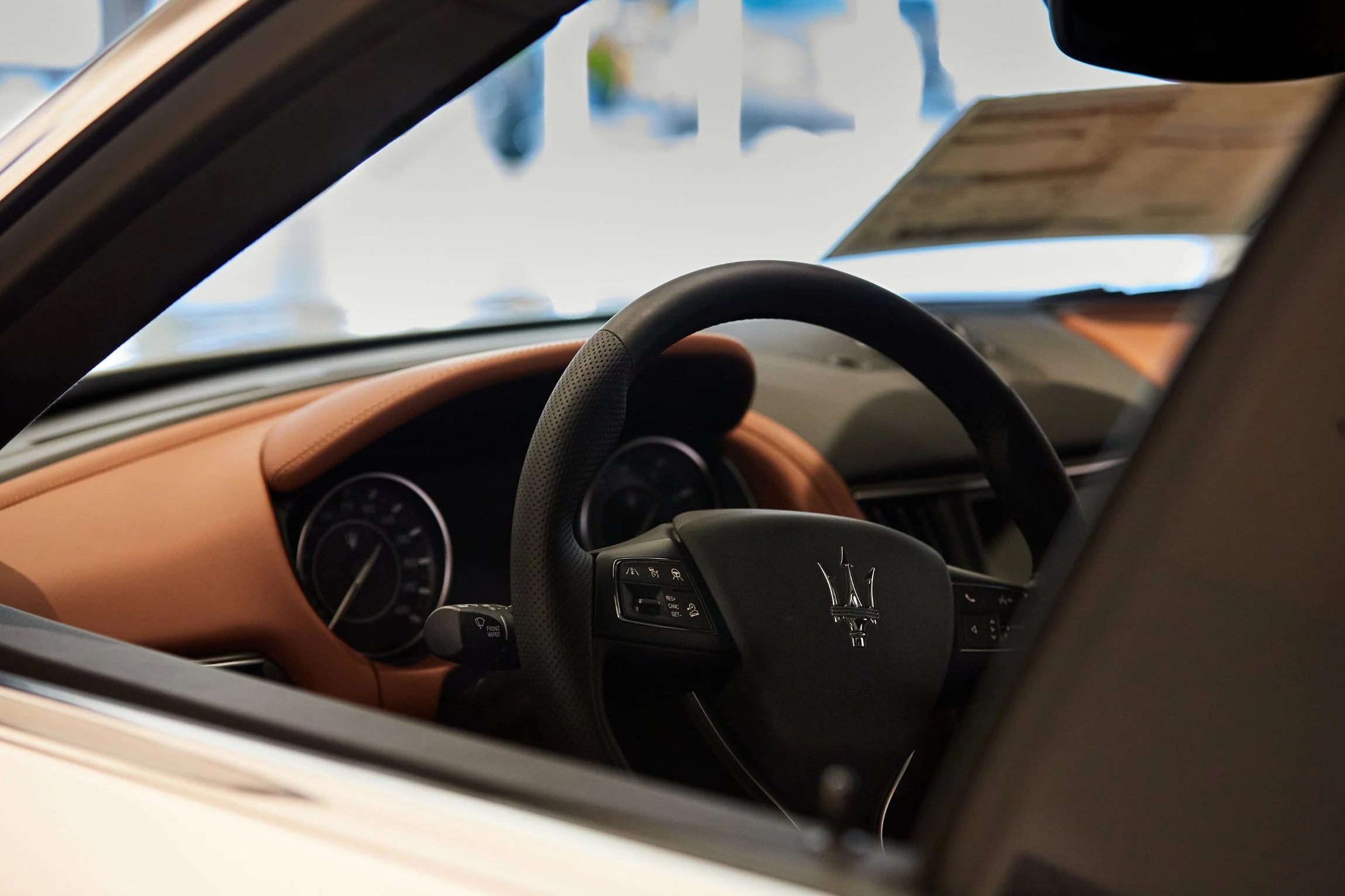 have a seat in this white Maserati behind the steering wheel and go for a ride taken by commercial professional photographer torsten glaenzel