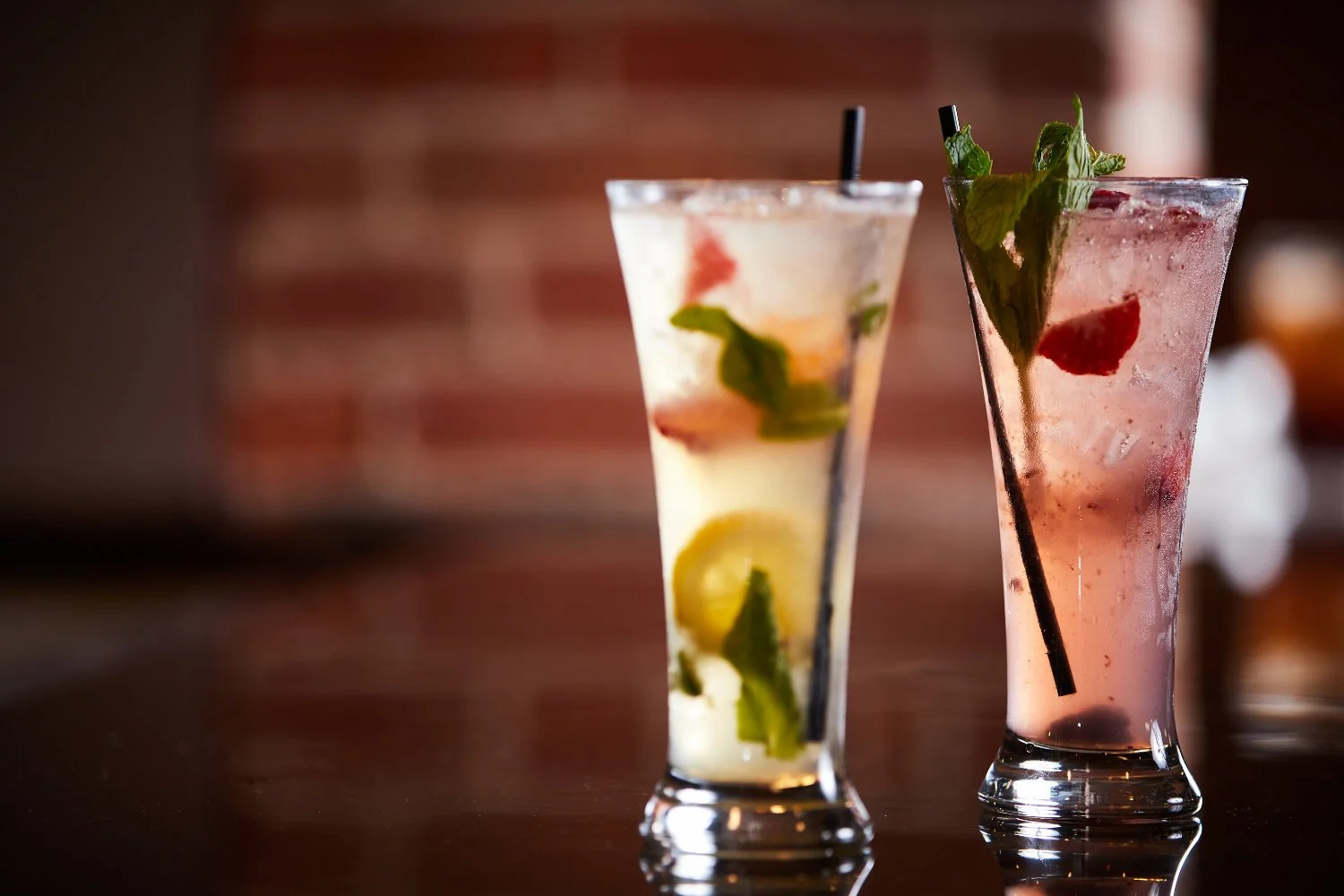 cocktails and chilled drinks in a restaurant served cold strawberry with a warm food aside on a great evening and for every occasion and celebration not just commercial by torsten glaenzel photography