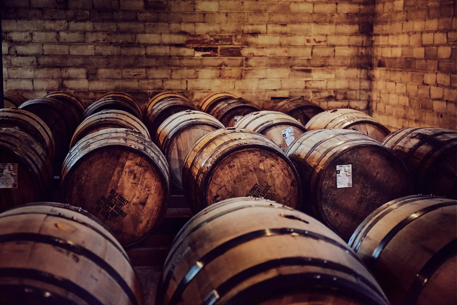 barrel after barrel in the historic downtown of faribault with 10000 drops distillery in Minnesota where craft has its home and a name by torsten glaenzel photography in commercial