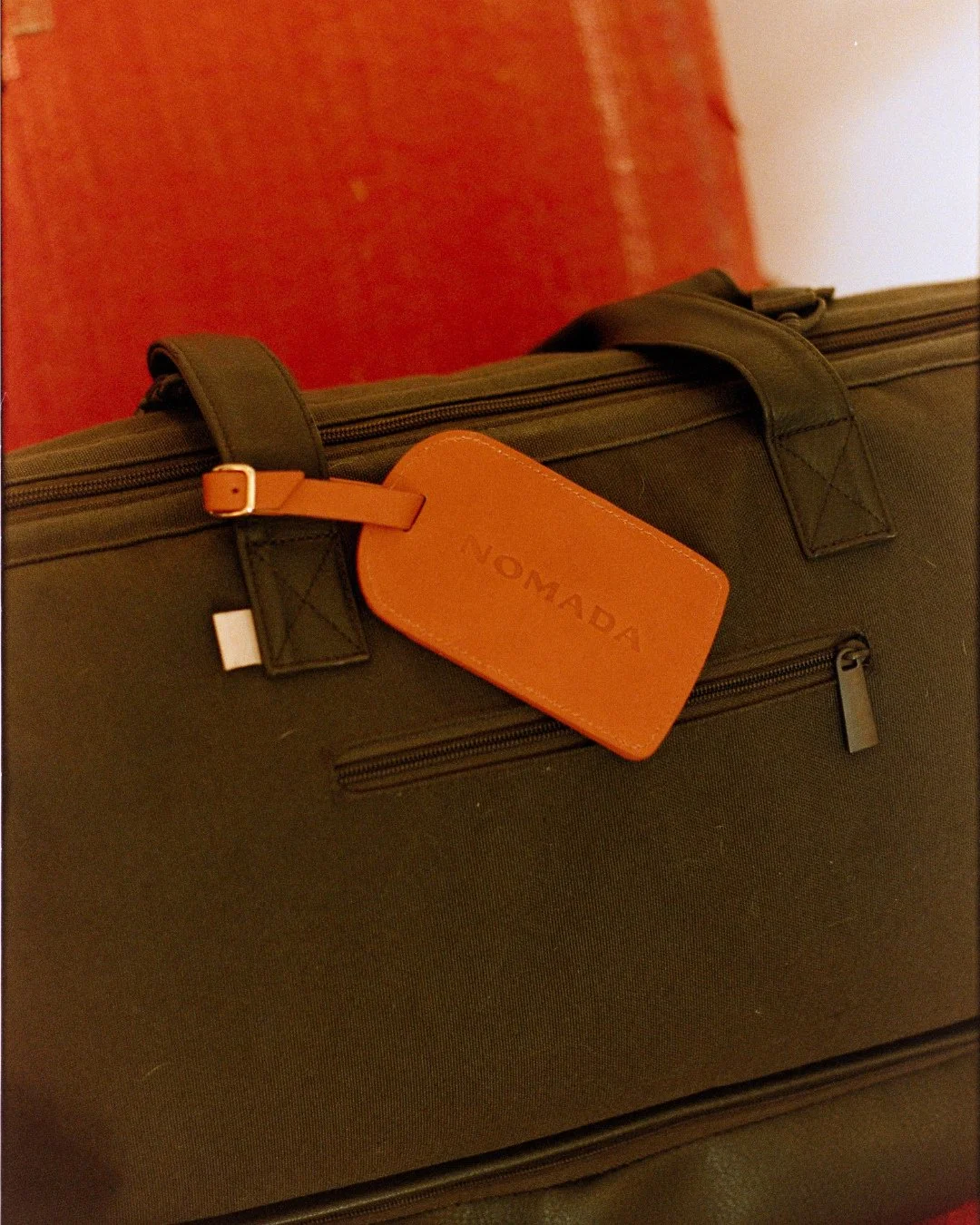 Proof of mileage. The Nomada luggage tag &mdash; for Members and Roadies only. Join the club today or earn status by completing the Road Tour. Details linked in bio.⁠
⁠
.⁠
.⁠
.⁠
⁠
Photo: @everwavecreative