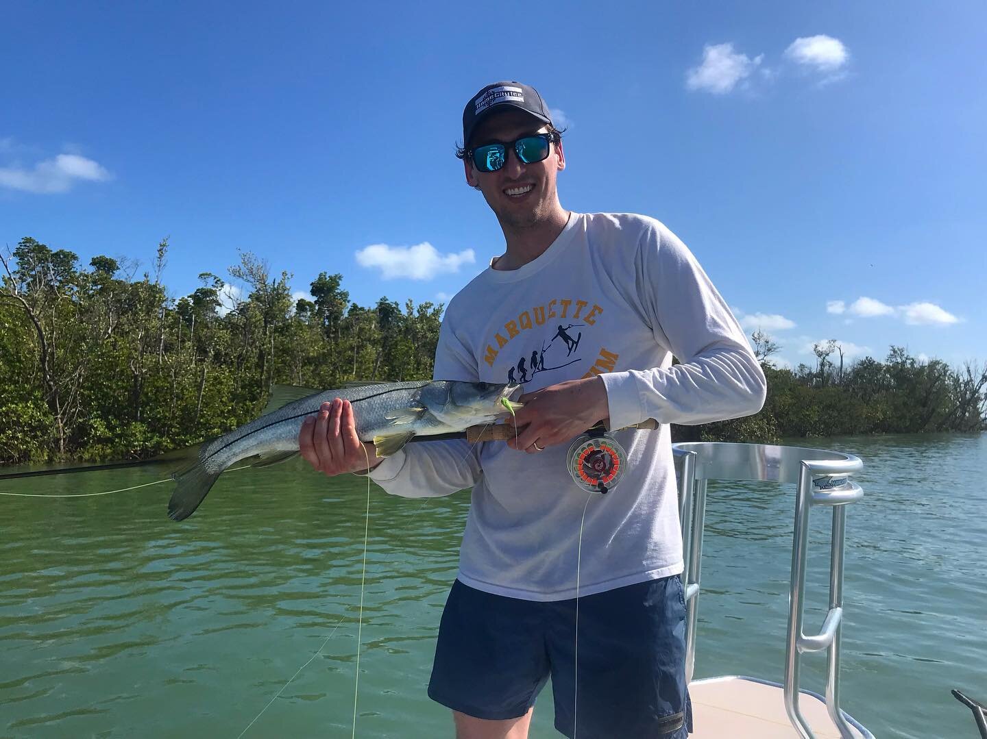 First Snook on fly and a big girl on the spin for Scott yesterday. After an hour and a half of fighting the fish, a small bull shark tried to take a bite but luckily she broke herself off in the trees and swam off unharmed... #flyfishingmarcoisland#f