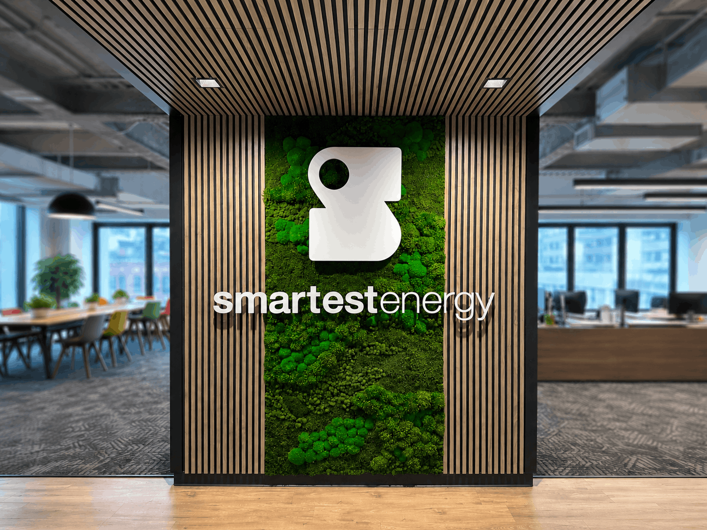 Preserved moss wall with Smartest Energy logo and wordmark, corporate office — Urbanstrong