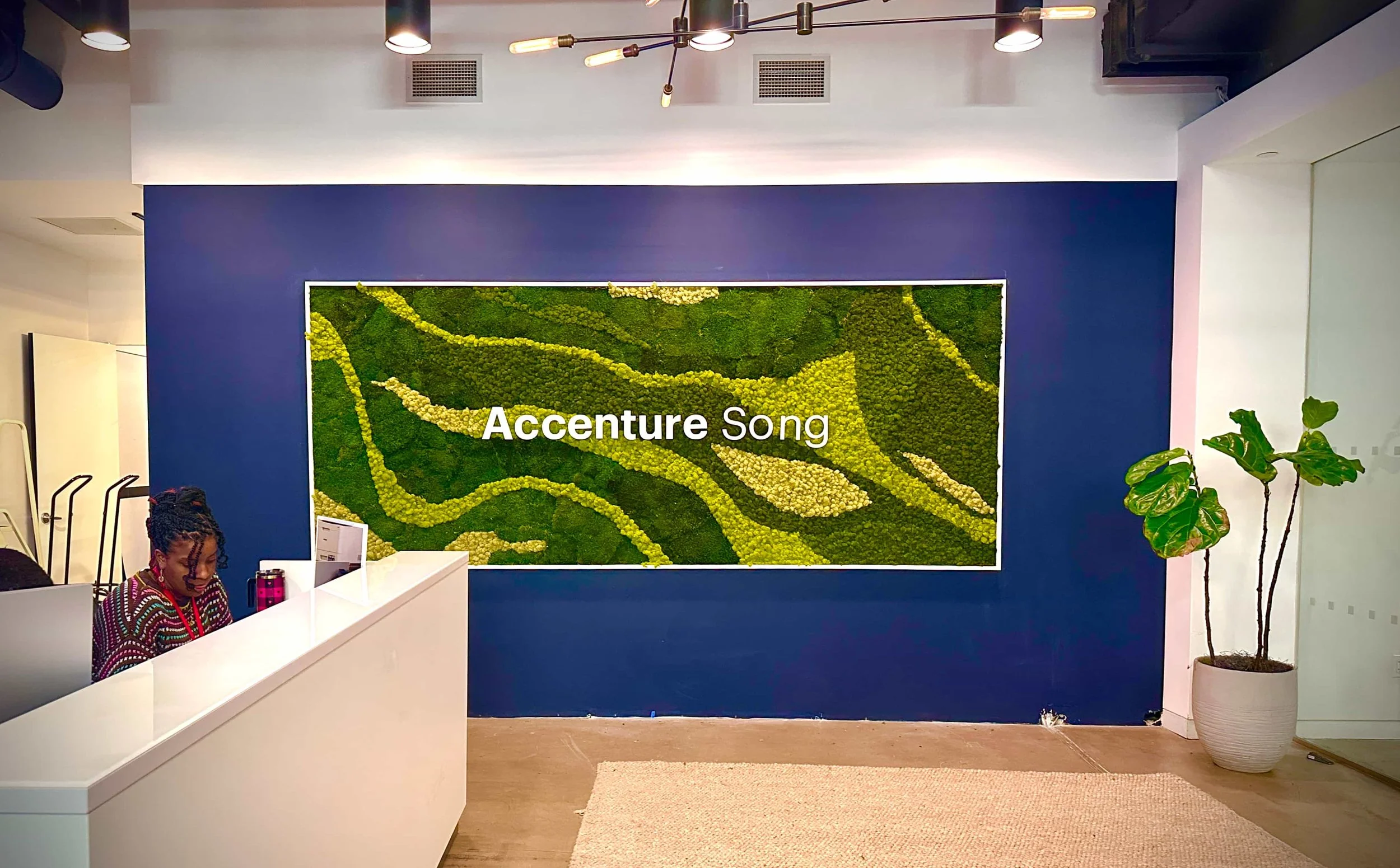 Framed preserved moss wall with Accenture Song logo, Manhattan office lobby — Urbanstrong