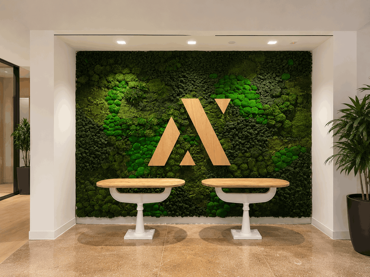 Preserved moss wall with Axoni custom wood logo in corporate lobby — Urbanstrong