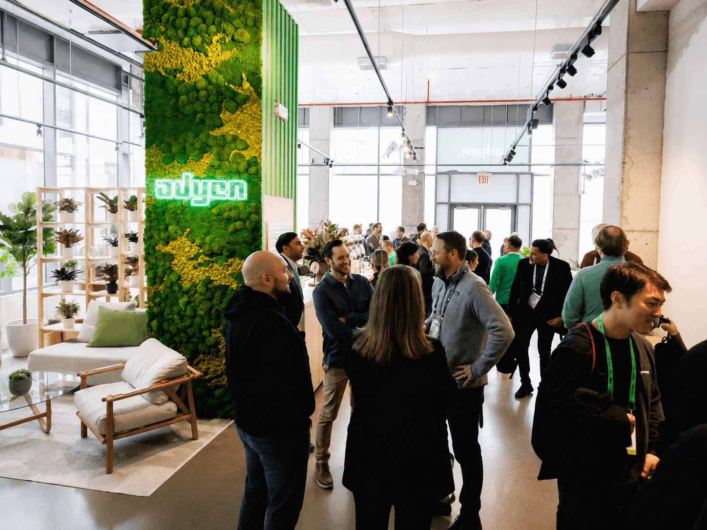 Preserved moss wall tower with branded neon signage, Adyen event space, Chelsea, NYC by Urbanstrong