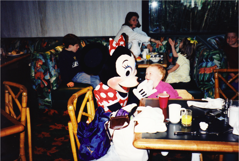 Me with Minnie Mouse at Ohana in the Polynesian Village Resort, 1 week shy of age 2