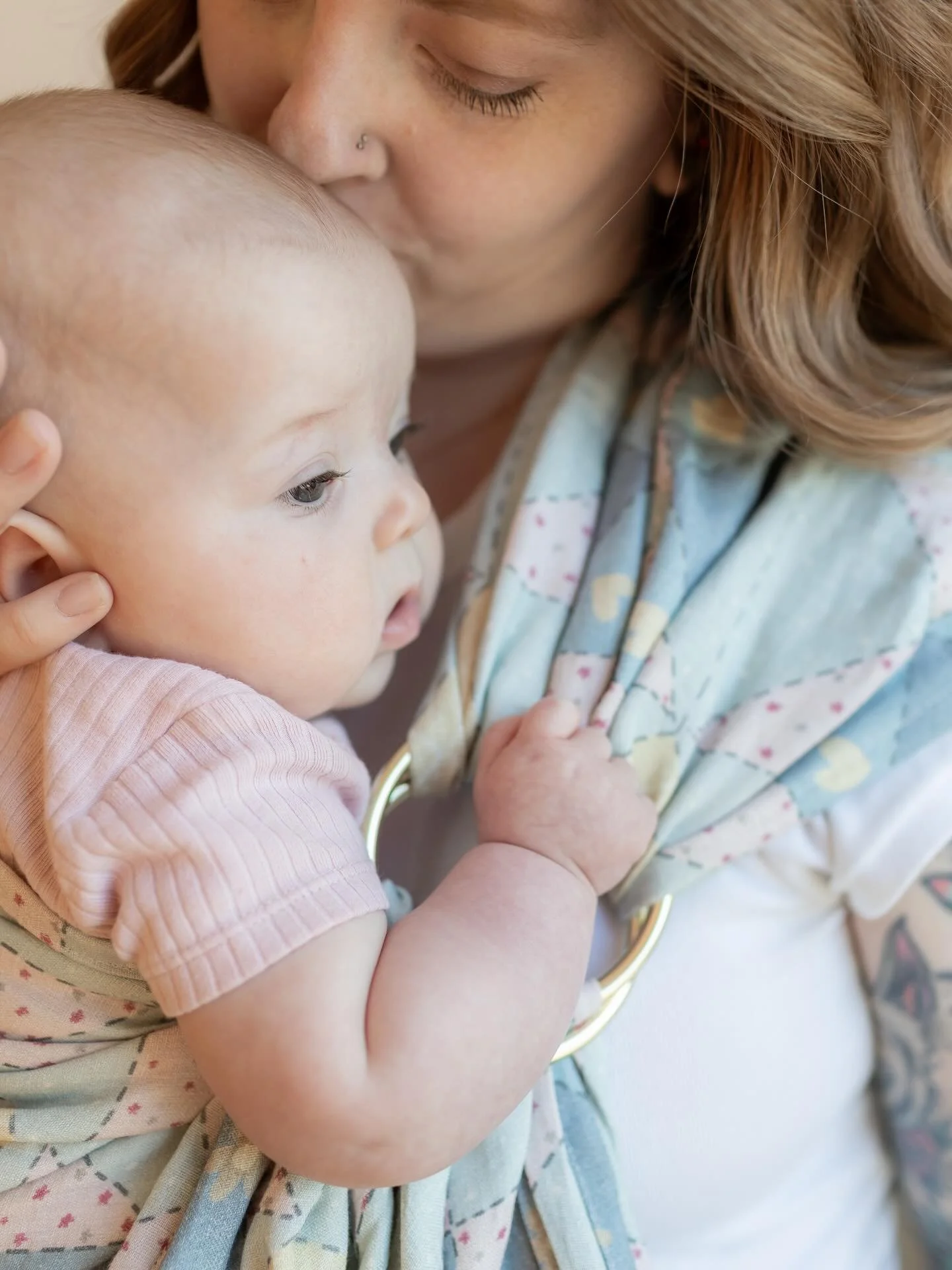 Sweet moments with my little June bug
💜
Loved being able to participate in another @loveheld photoshoot! 💛
If you&rsquo;re looking for a baby carrier these are so light weight, beautiful, and easy to use. 
🩷
Thank you for the amazing photos @lovel