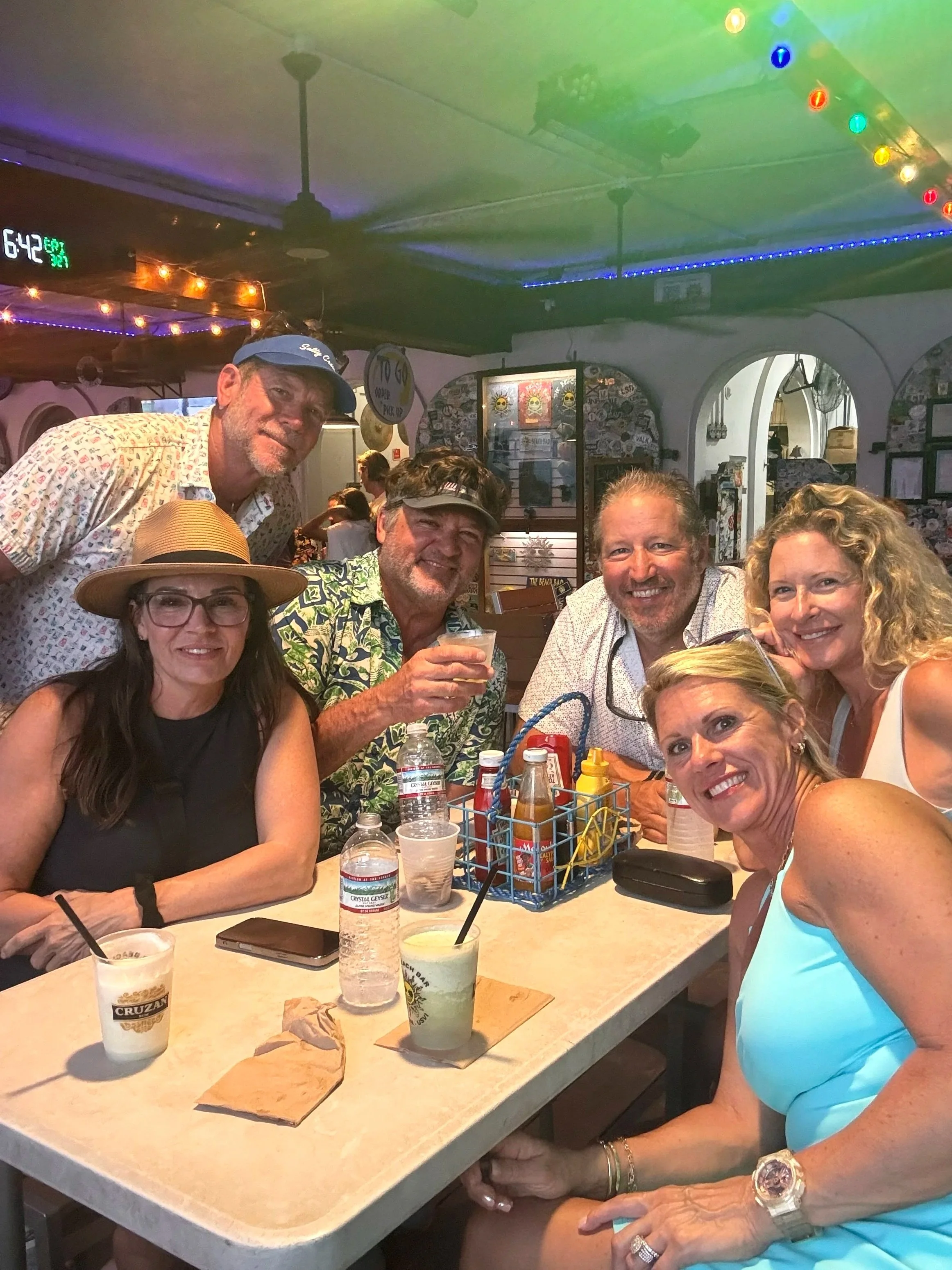 Guest enjoying a drink at Skinny Legs in St John, Coral Bay