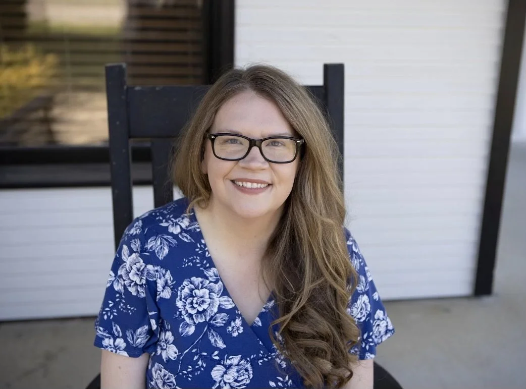 Dr. Olivia sitting outside at her office.