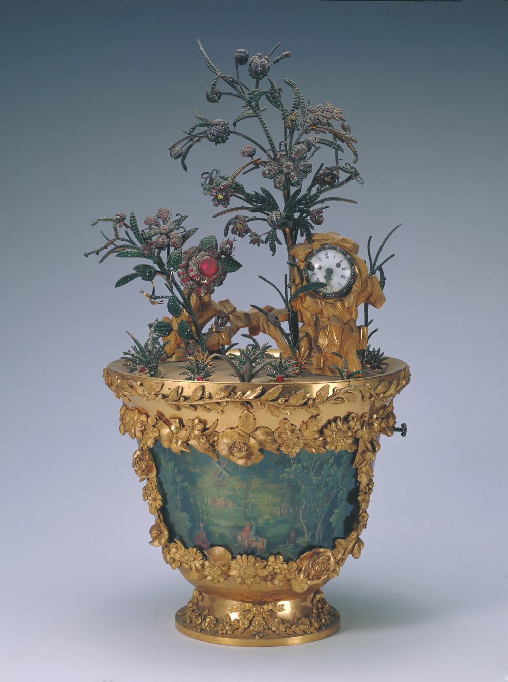16. 铜镀金圆花盆式跑人嵌料石花表 Zimingzhong in the form of a pot of artificial flowers © The Palace Museum.jpg