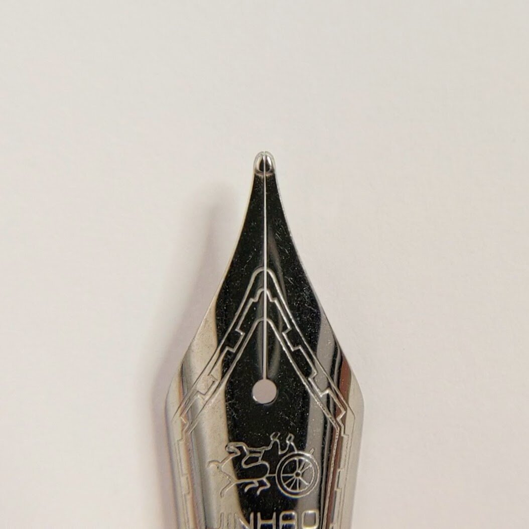 This is an example of a well tuned tine gap. The gap tapers toward the end of the nib but is still slightly apart at the tipping material.