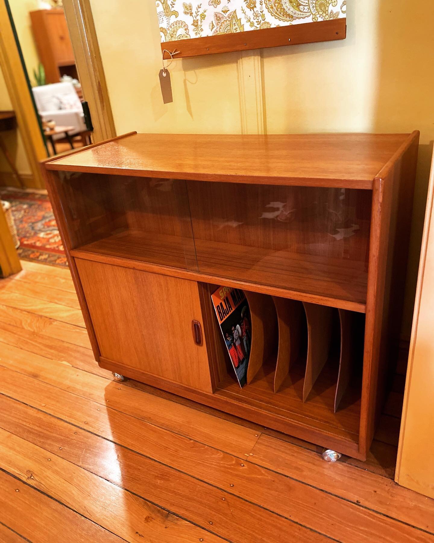 - Audio / Vinyl Storage Cabinet

Mid Century Teak Audio Cabinet with dedicated LP / Vinyl storage.
 
Two glazed sliding doors over two storage cupboards. Recessed back to accomodate electrical cords / audio equipment.

$580 - comment sold to purchase