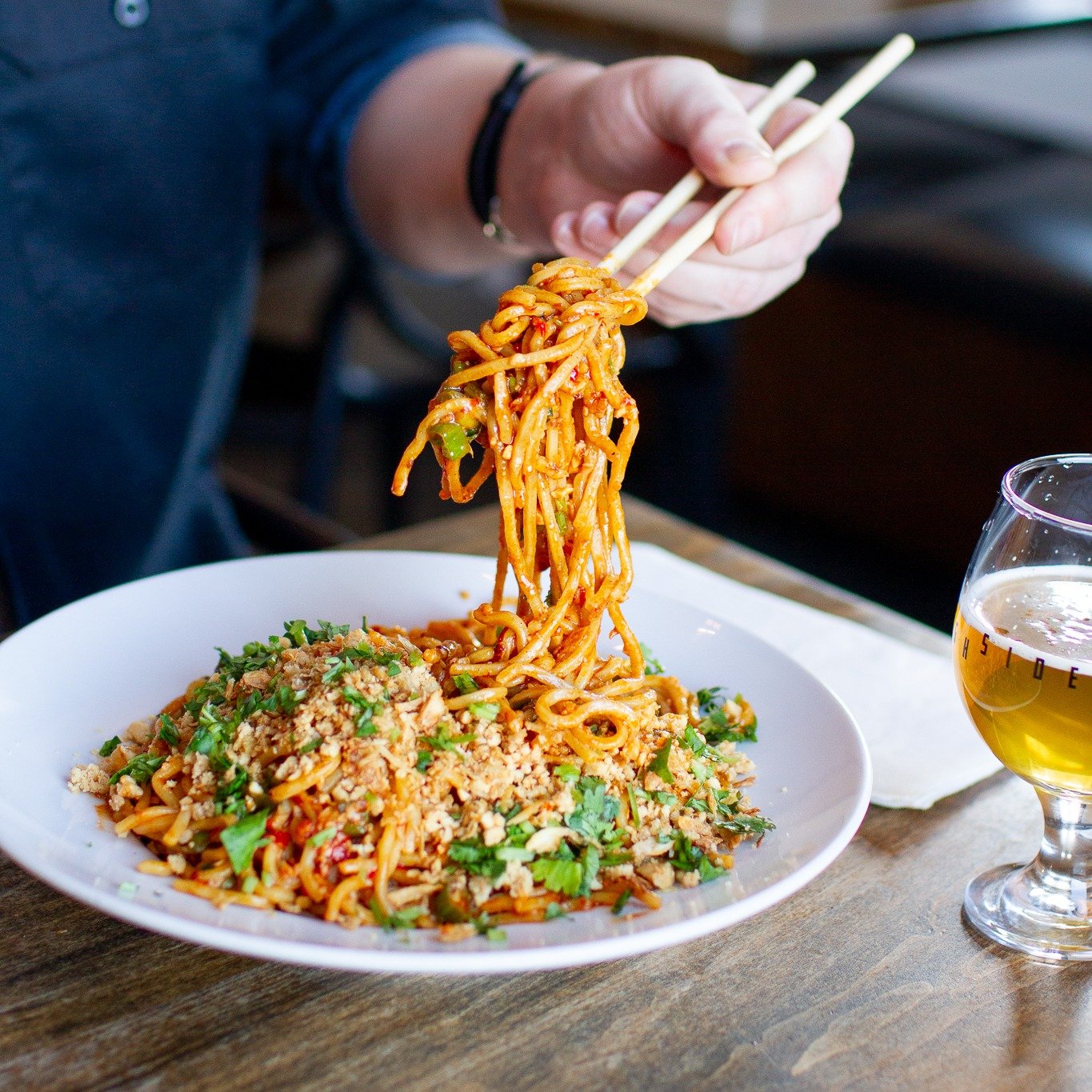 Haven't you tried our Dan dan noodles? Check it out today! We serve it with house-made mala chili oil, sesame sauce and then garnish it with toasted peanut, fried shallot, and a hand full of scallion and cilantro. It's spicy 🌶 , savory, and vegetari