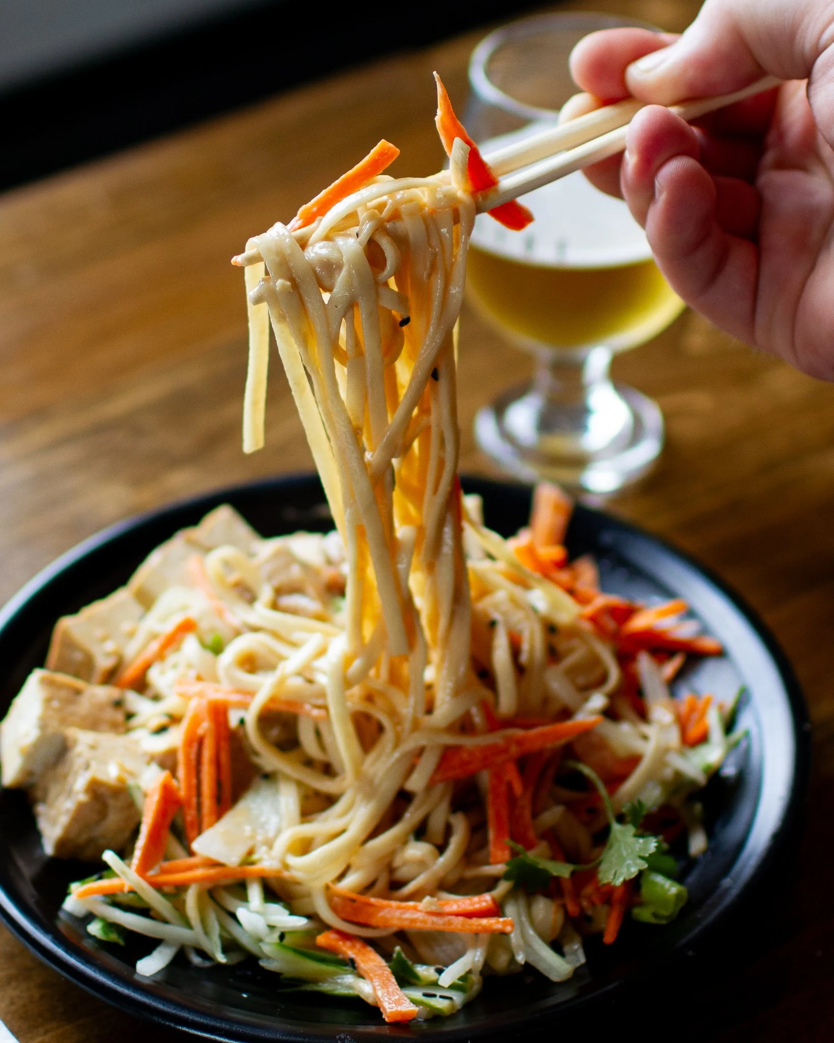 After all the holiday over-eating, this is the kind of dish your body actually thanks you for. Our Cold Sesame Noodles are light, refreshing, and packed with clean, bold flavors : wheat noodles tossed with tofu, cucumbers, carrots, garlic, scallions,
