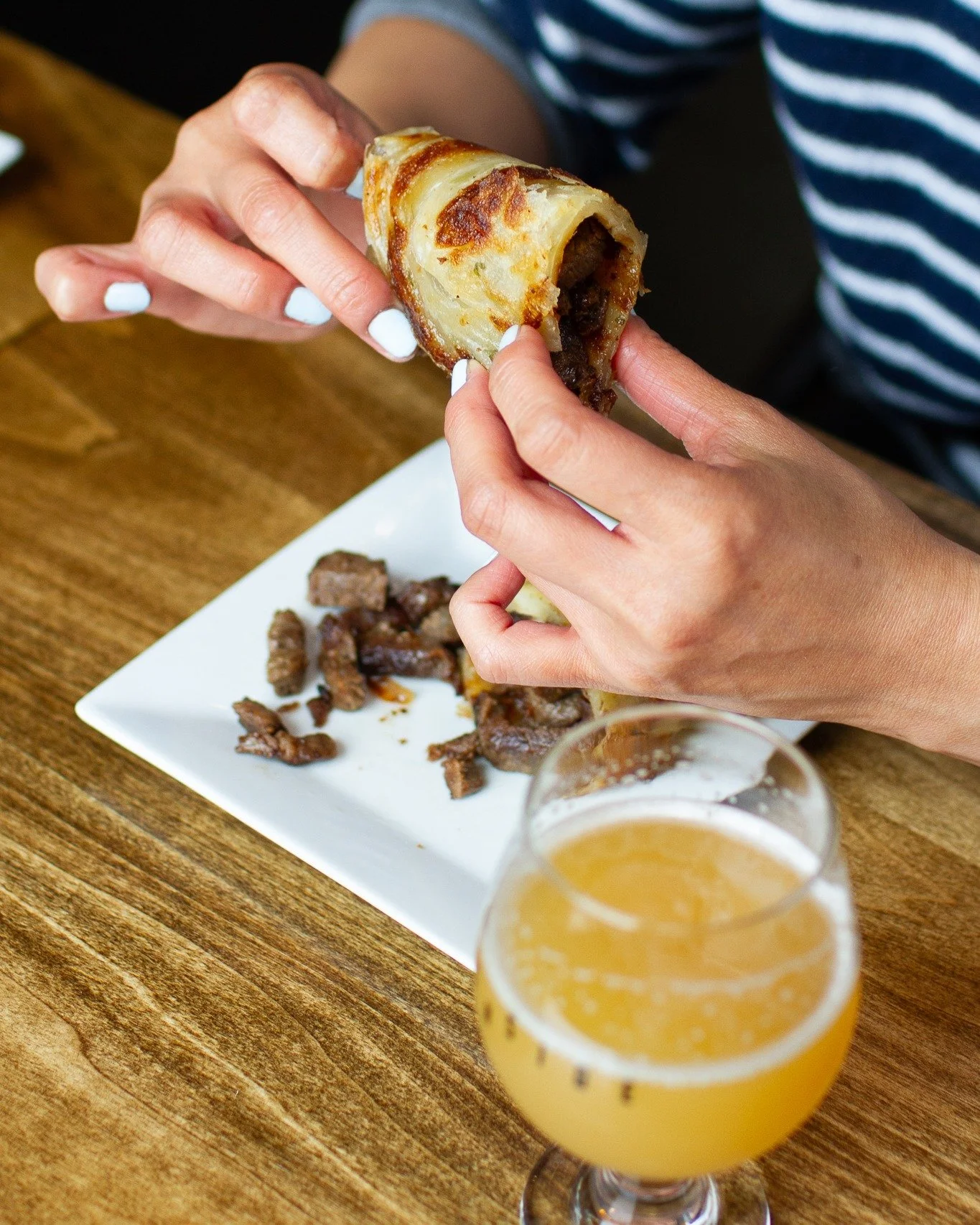 Crispy, flaky scallion pancake layered with savory, tender stir-fried beef. It is the kind of dish that gives you everything at once. Crunch, richness, umami, and just enough comfort to make you slow down and enjoy it.

Best enjoyed hot, shared with 