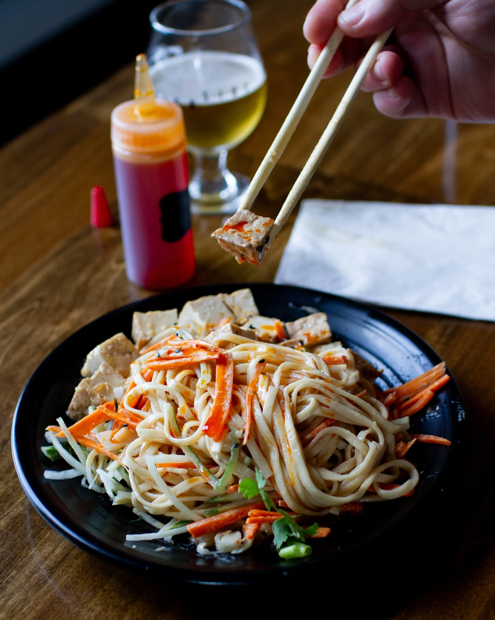 Chilled noodles tossed in a rich sesame sauce with garlic, soy, vinegar, and cucumber, balanced in a way that feels cool, savory, and deeply satisfying from the first bite. It is the kind of dish that stays light but never skimps on flavor. Add a dri