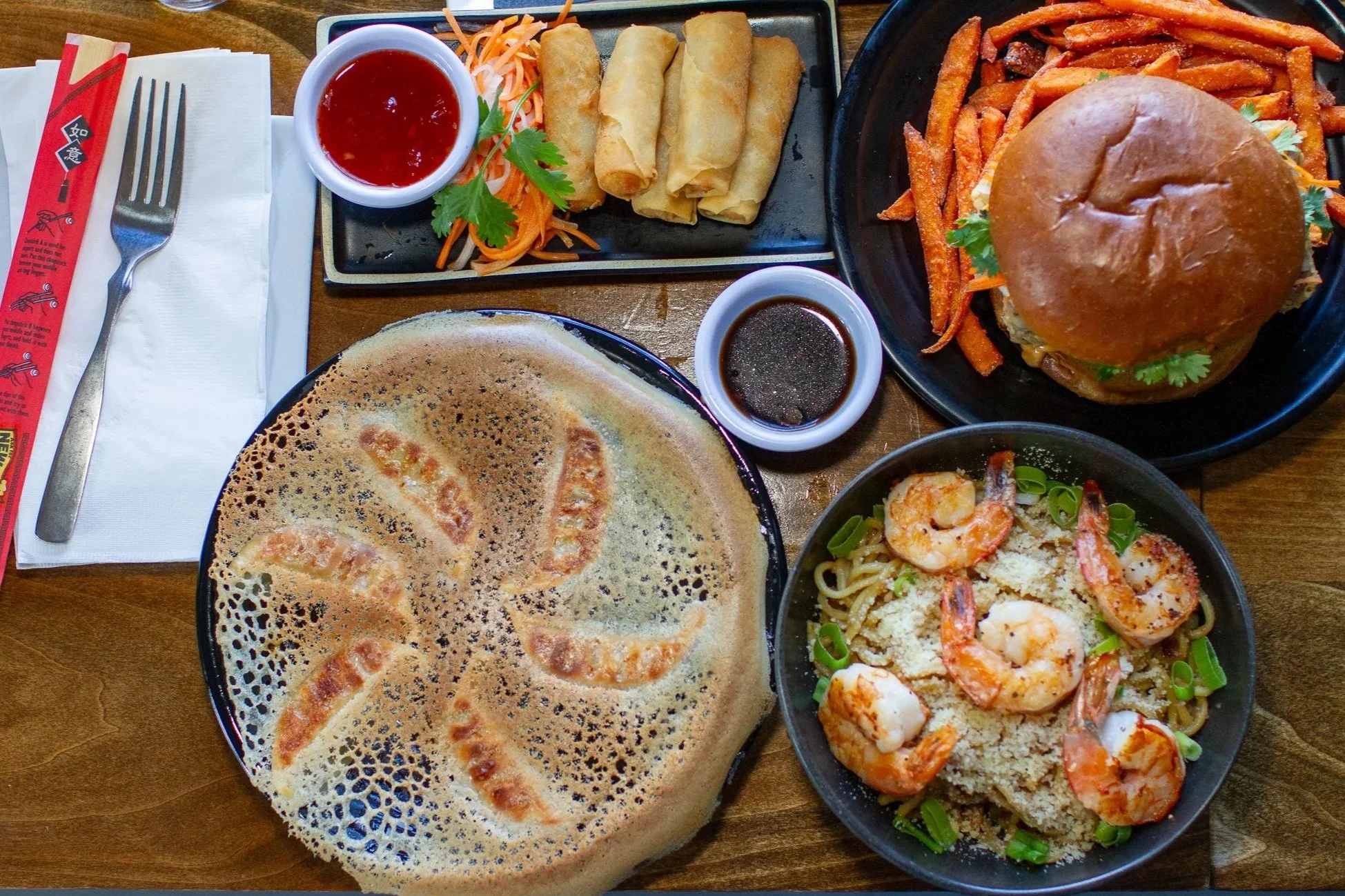 Potstickers, Garlic Noodles with Grilled shrimp, veggie spring roll and crispy tofu sandwich