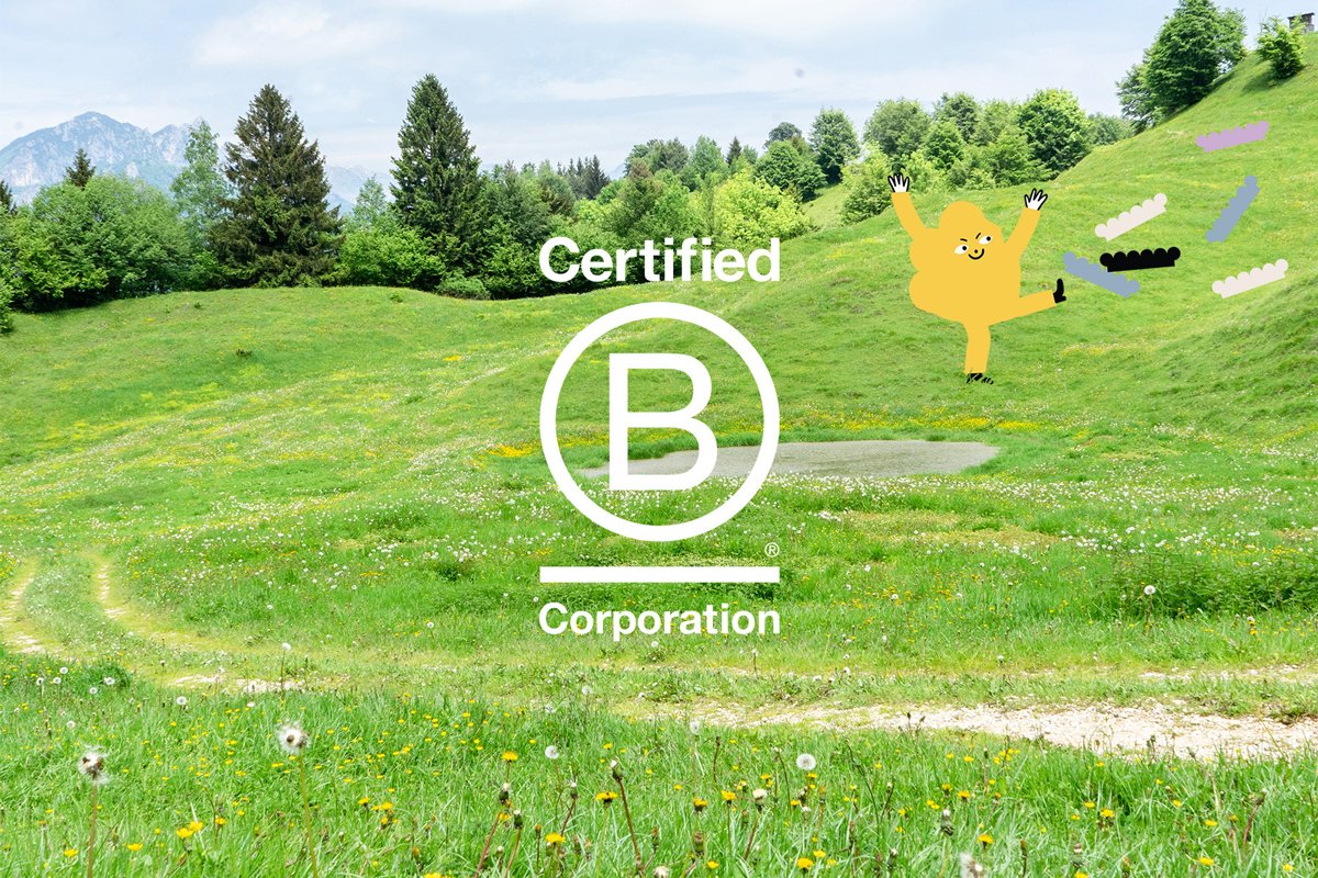 Woola character on a field with B Corp logo in the front