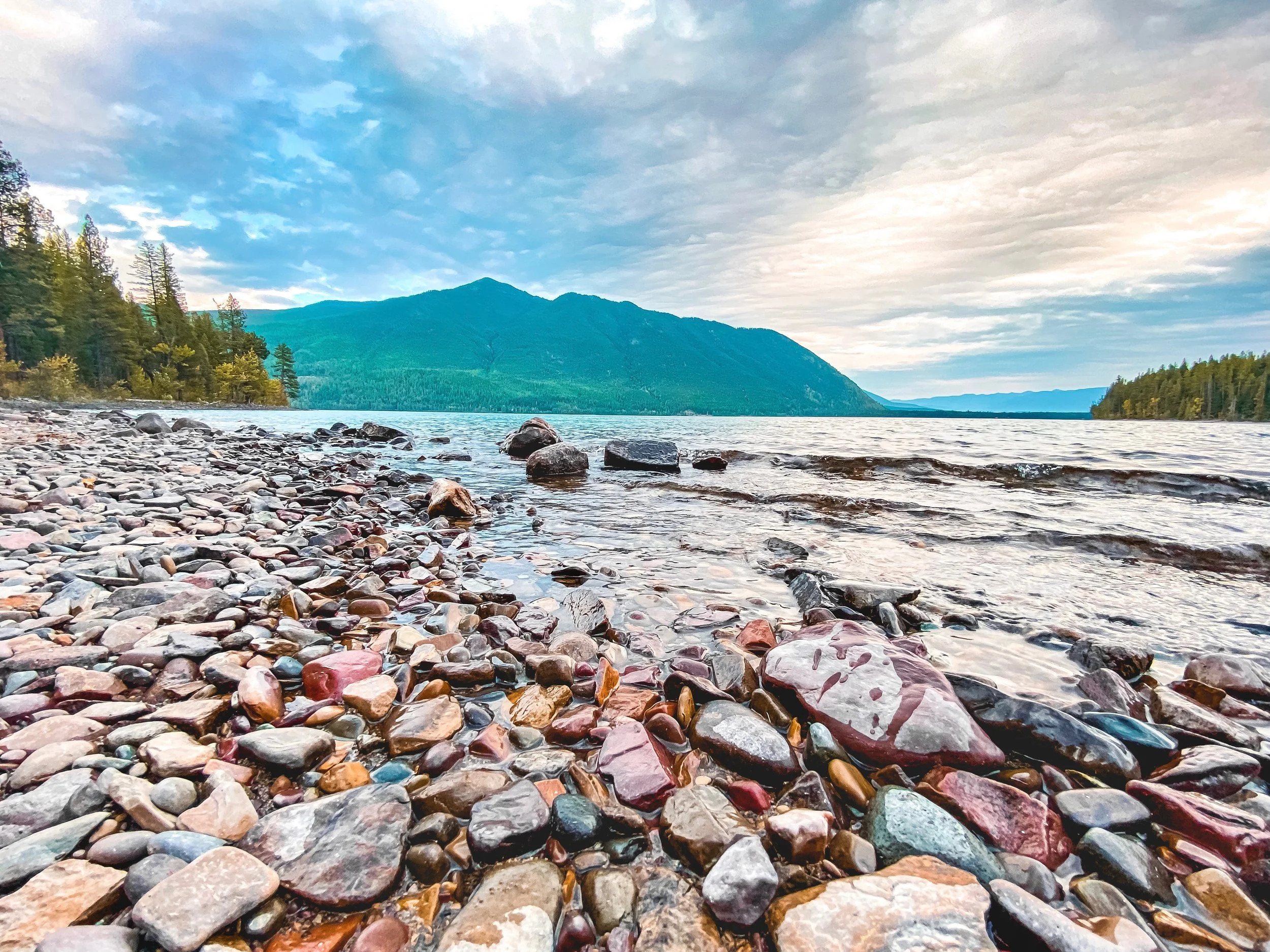 Glacier national park picture of rocks, water, and mountains