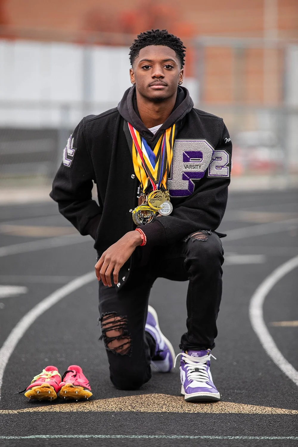 Track senior photo with medals