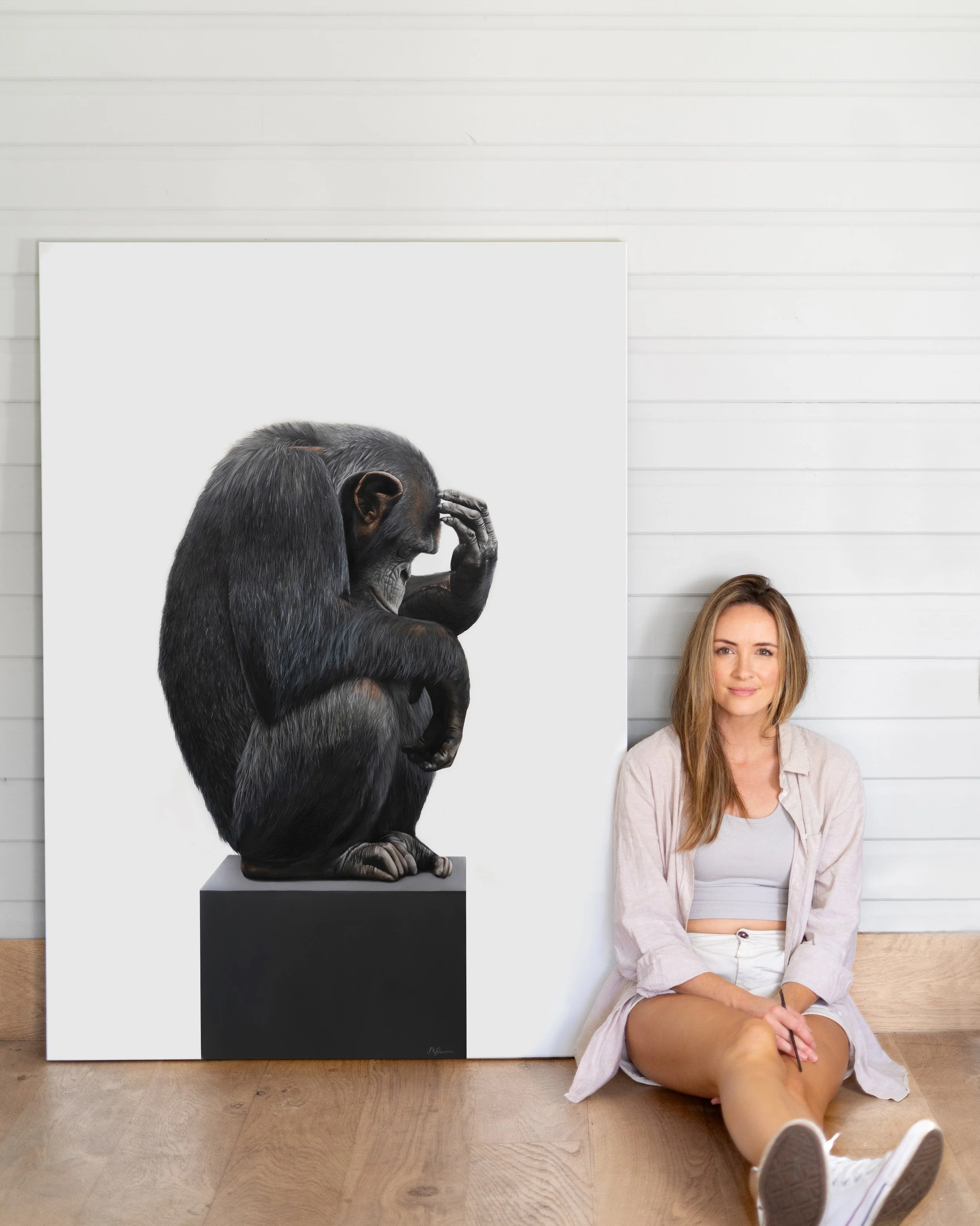 contemporary artist, sophie green, and a photorealistic painting of a chimpanzee