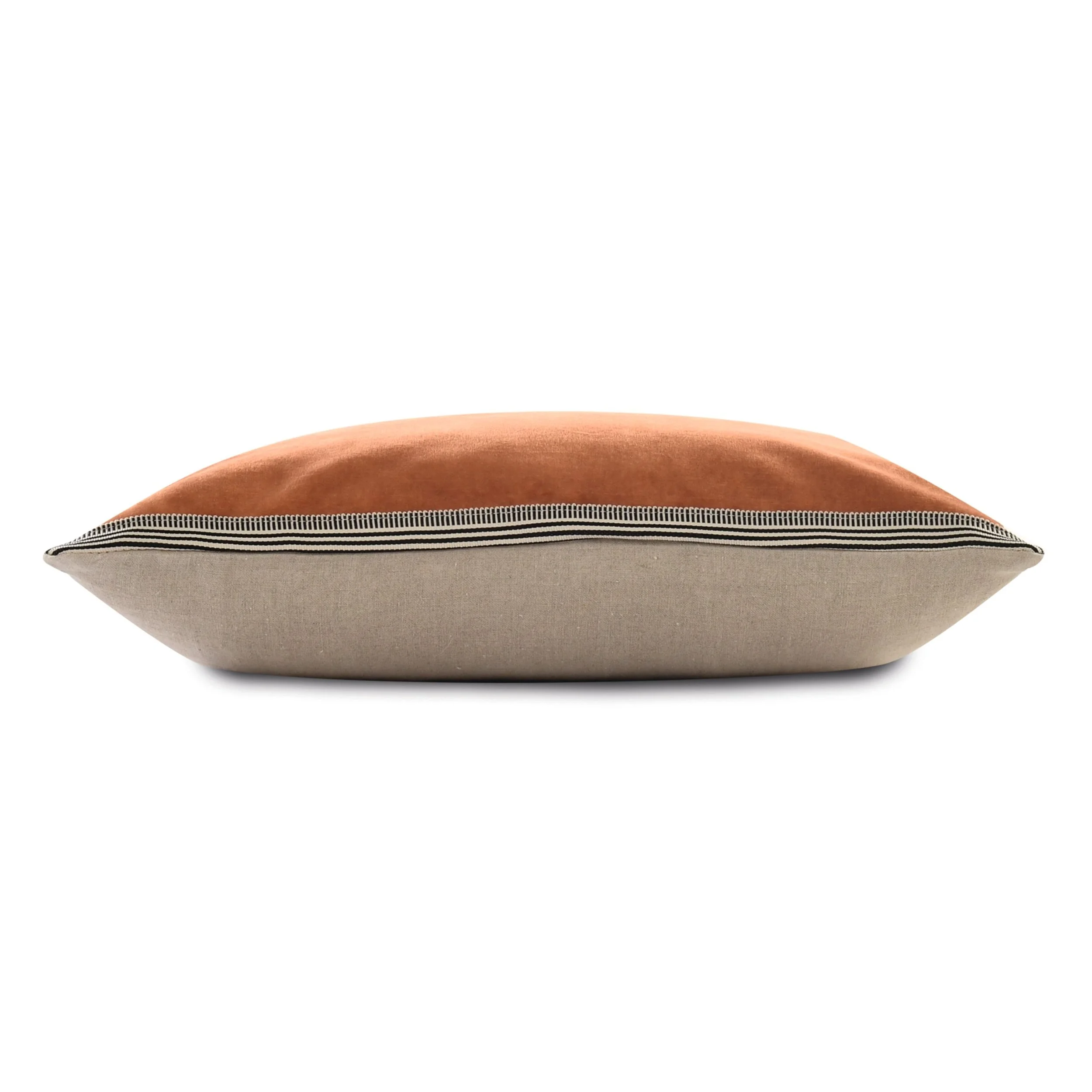 Side view of a Maison Casamance Manade cushion showing the velvet front, braid edge and linen back