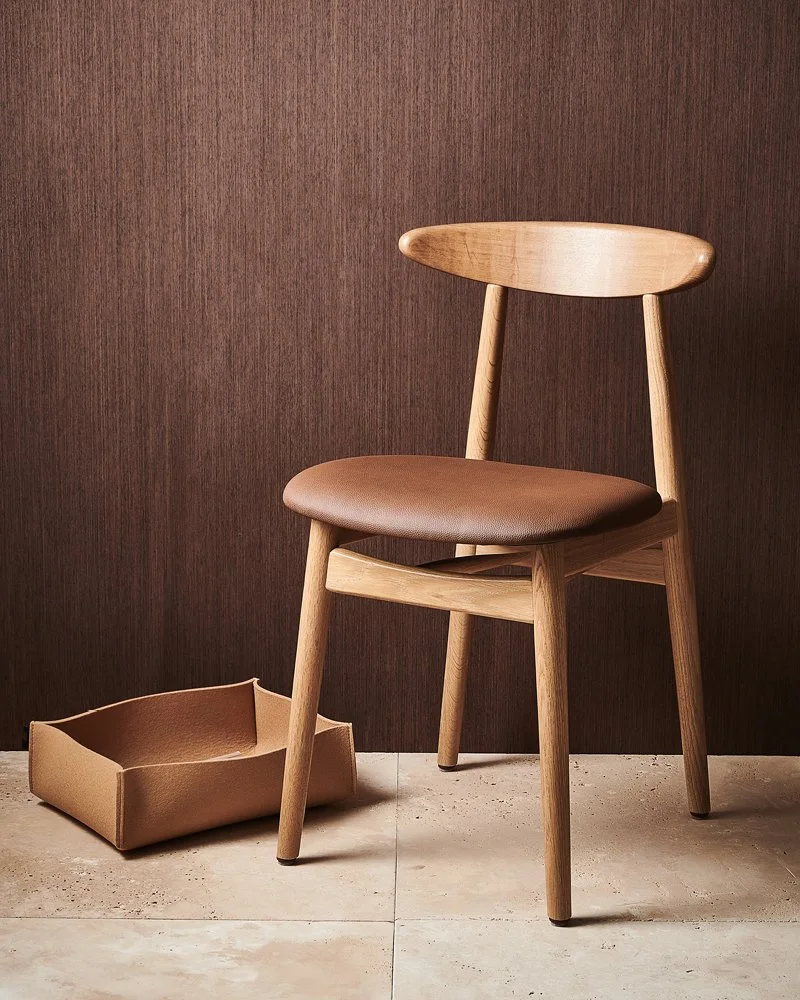The teo dining chair with fixed padded seat
