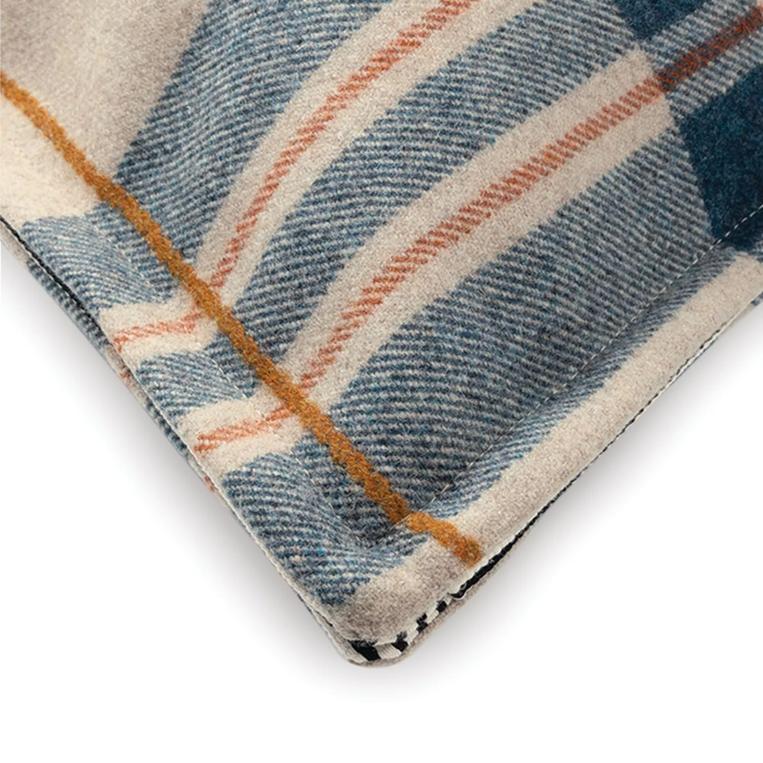 Maison Casamance Highland Bleu check cushion, close up of the navy, slate blue and rust check