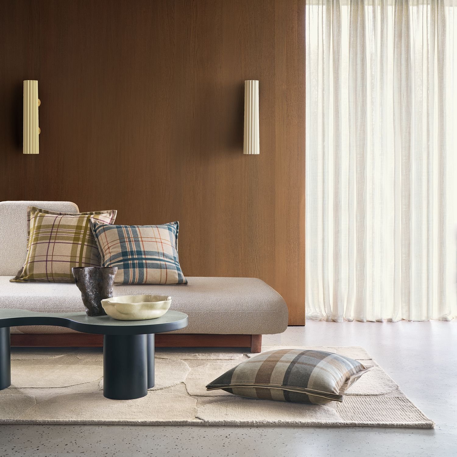 Maison Casamance Highland Vert cushion in a room setting, wider view