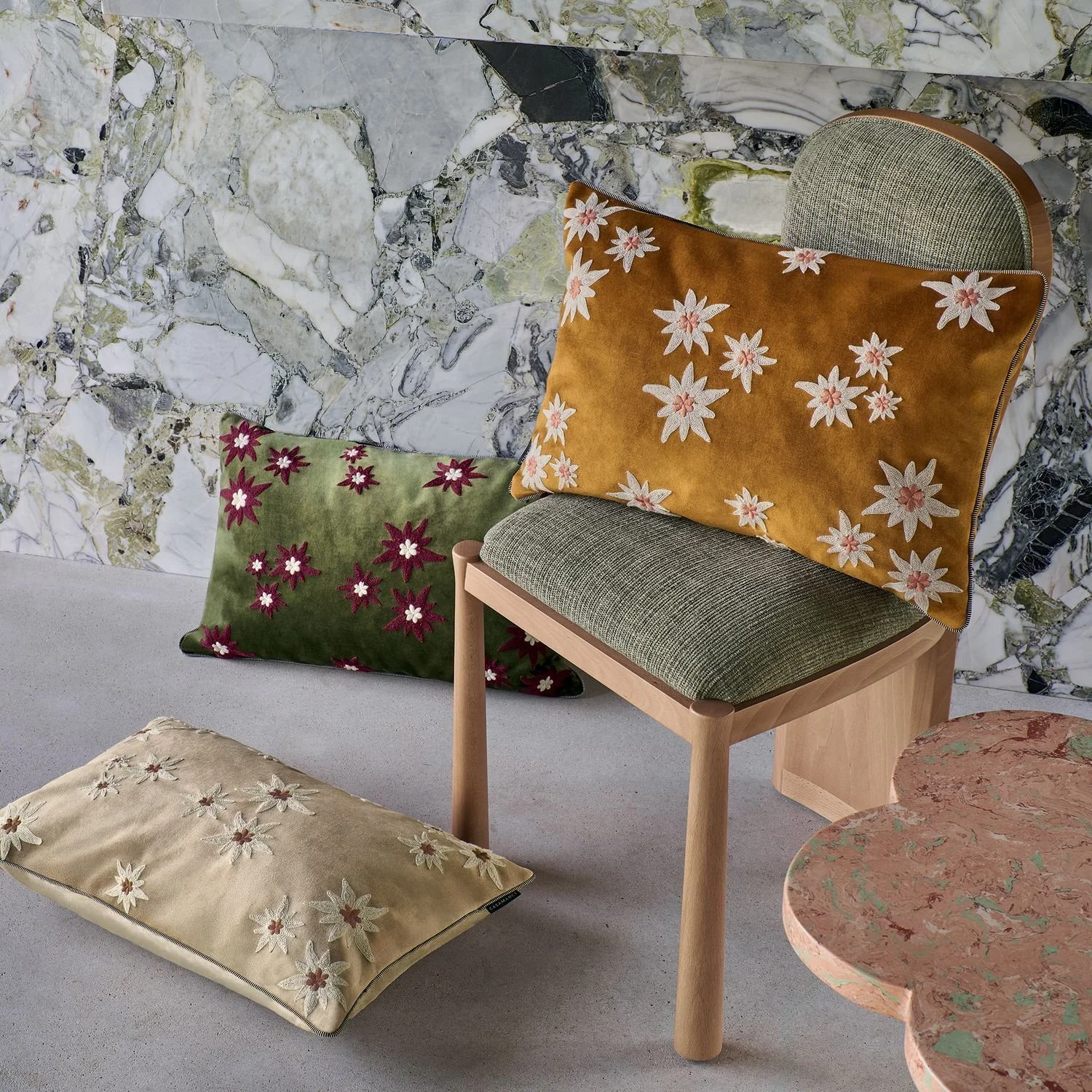 Maison Casamance Ness Vert Olive cushion in a room setting, wider view
