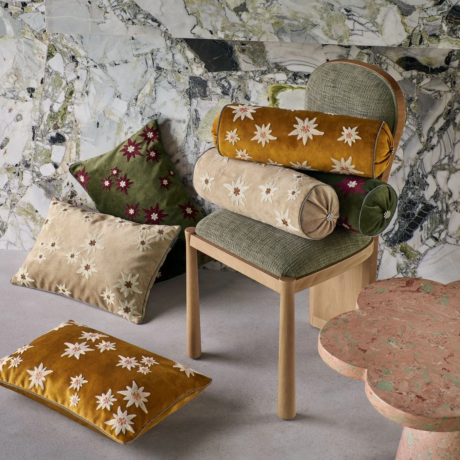Maison Casamance Ness Jaune Or bolster cushion in a room setting, wider view