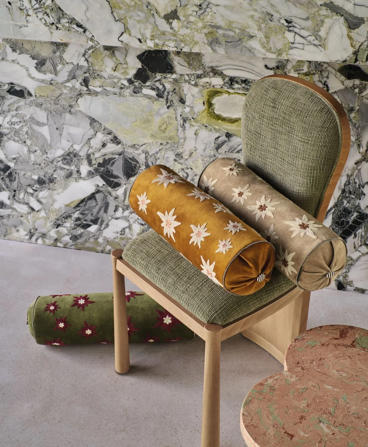 Maison Casamance Ness Vert Olive bolster cushion in a room setting