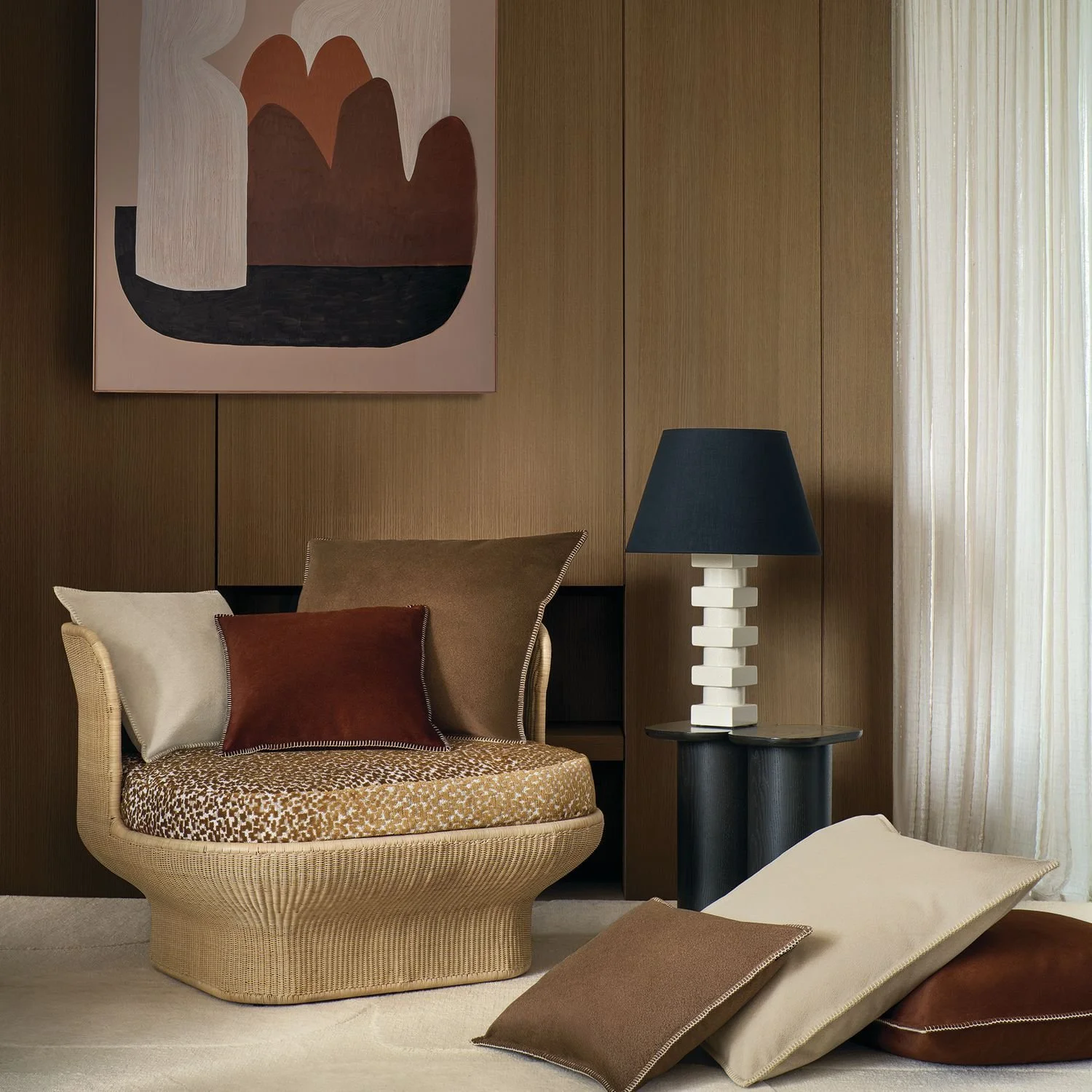 Maison Casamance Clyde Bronze cushion in a room setting, wider view