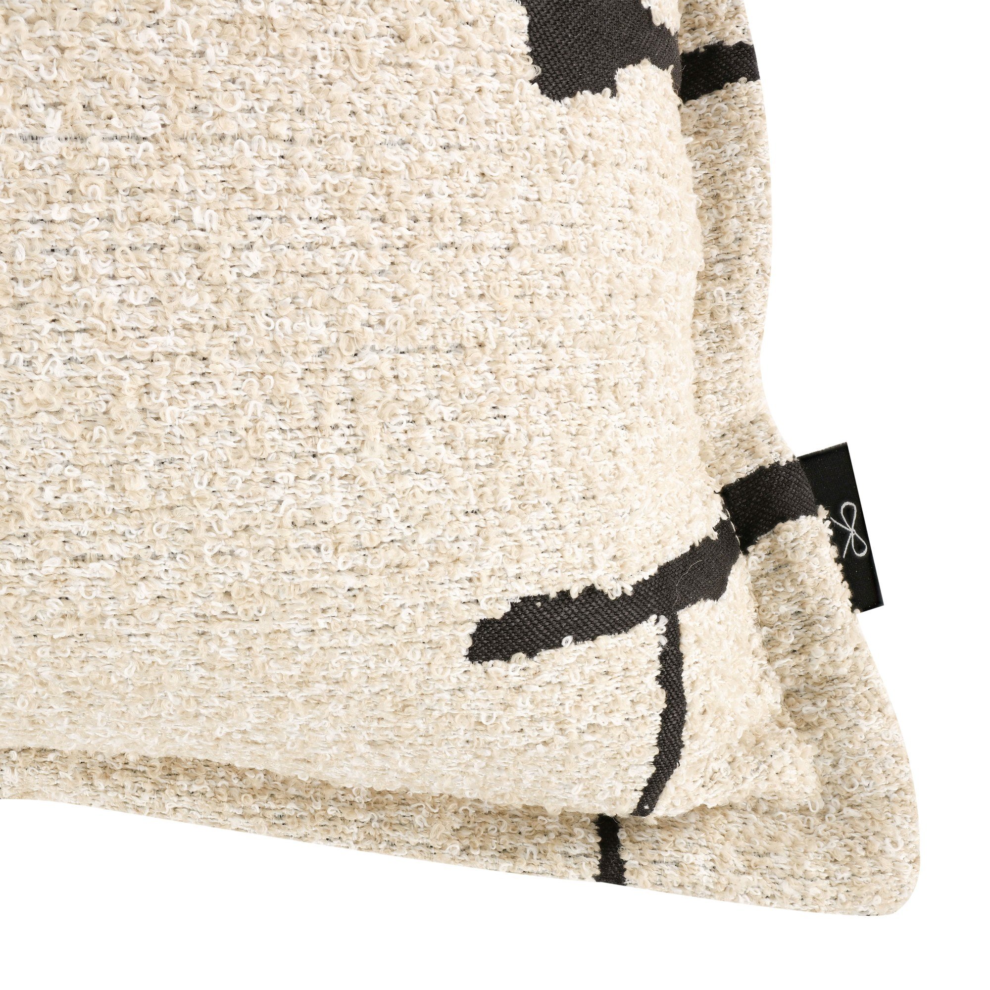 Black Edition Xandri Outdoor Avocet cushion, 55 × 55 cm, corner detail