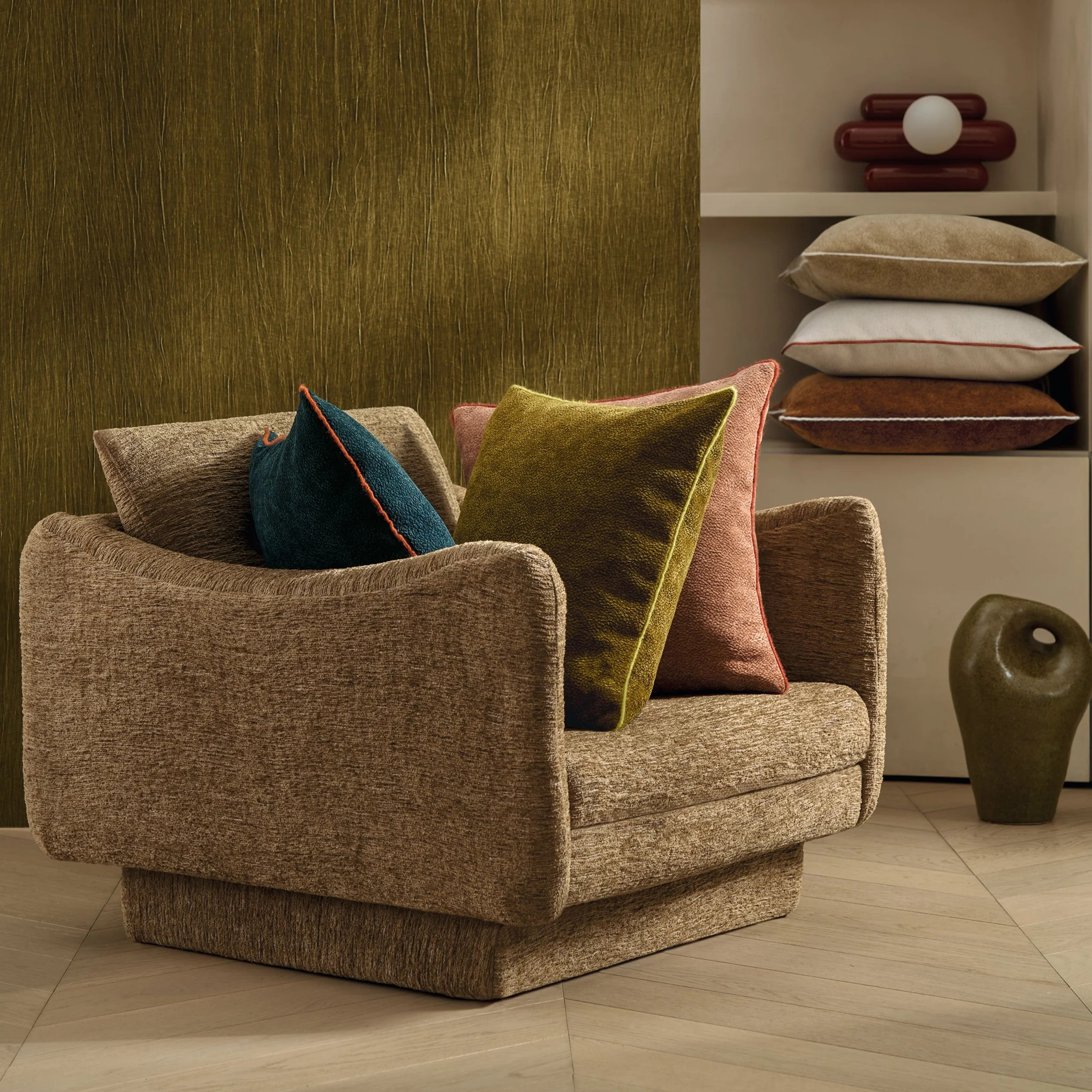Maison Casamance Chroma cushions styled in contemporary armchair setting