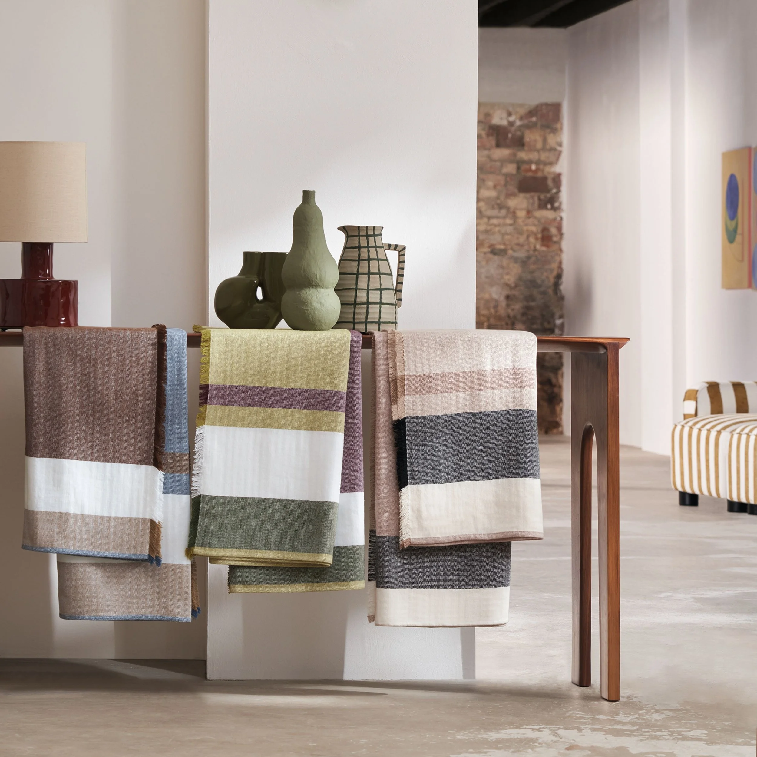 Folded Maison Casamance Talie throw with fringed edge detail