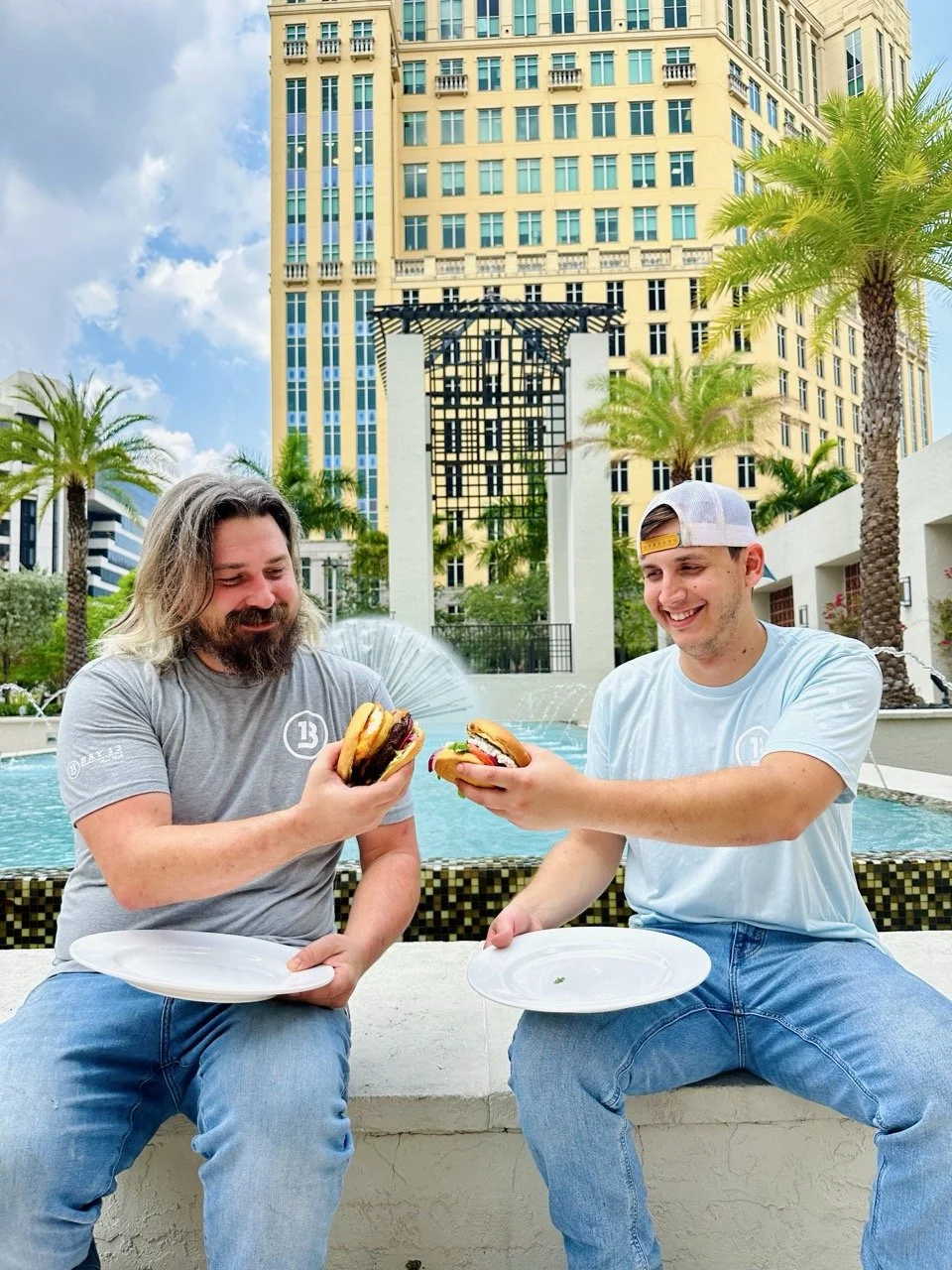 Bay 13 Greg and Cole Eating Burgers Coral Gables.jpeg