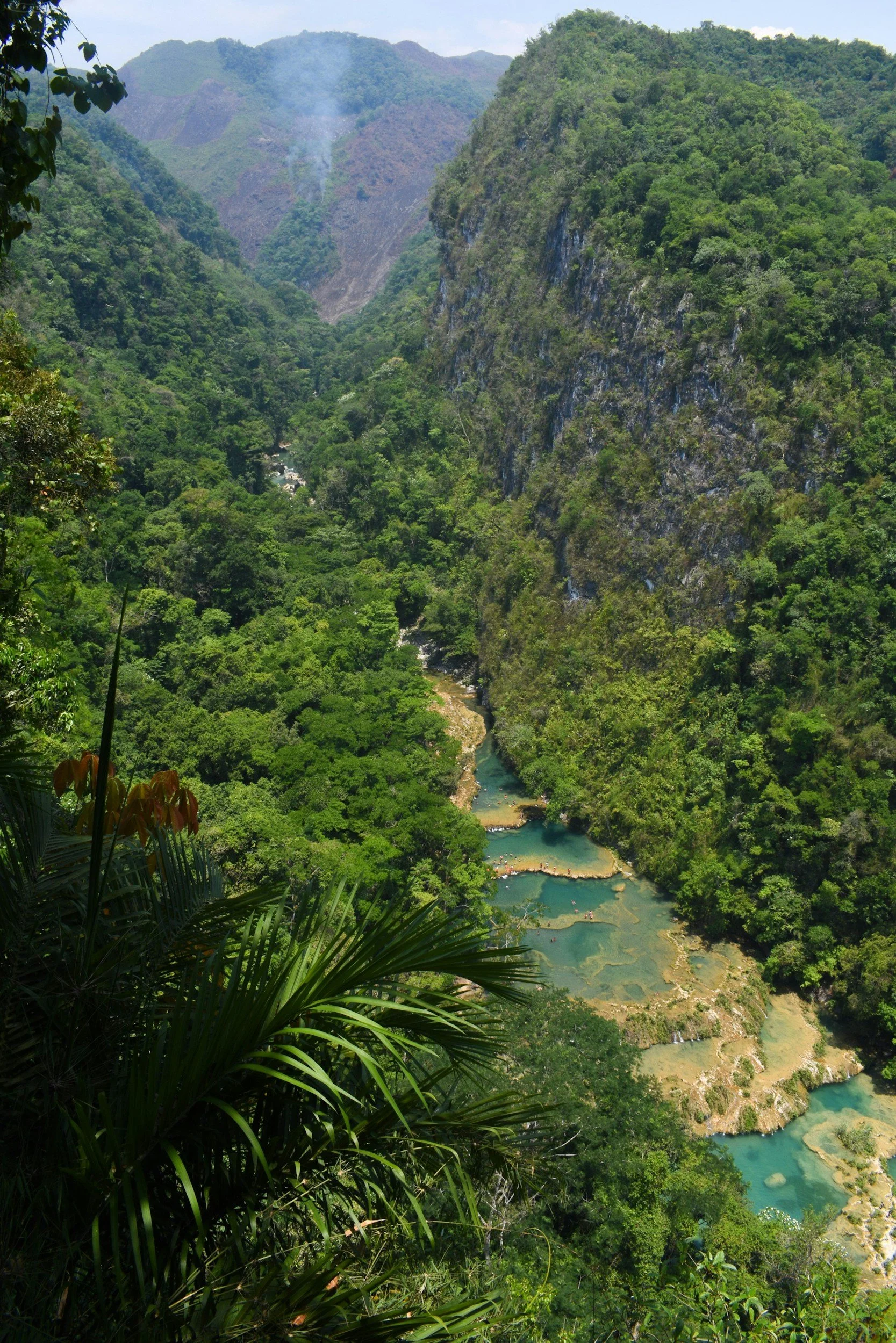 The turquoise colored waters of Semuc Champey, one of the best places to visit in Guatemala