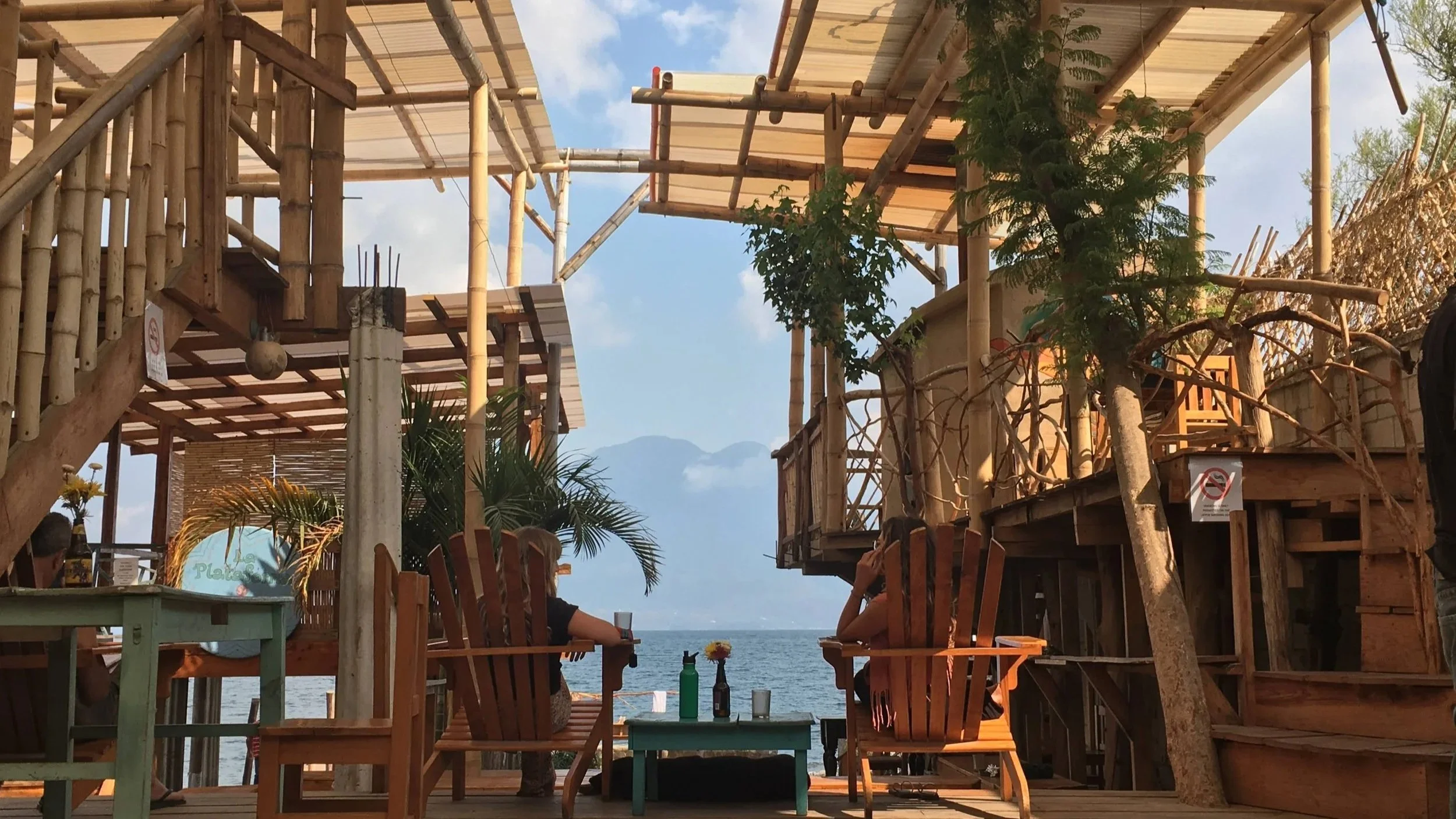 A gorgeous lake front deck with pretty eco friendly materials during a trip based on ecotourism in Guatemala.
