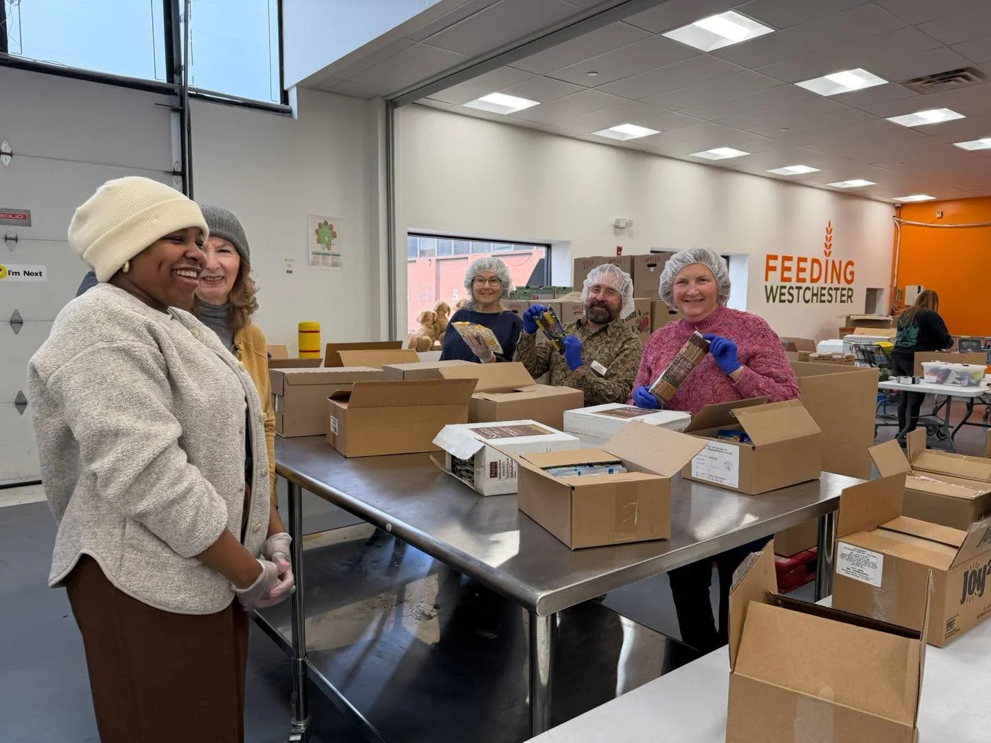 This morning, members of our Families Task Force rolled up our sleeves at Feeding Westchester, packing produce and shelf-stable items for local residents in need. This can be a tough time of year for those of us dealing with food insecurity. In addit
