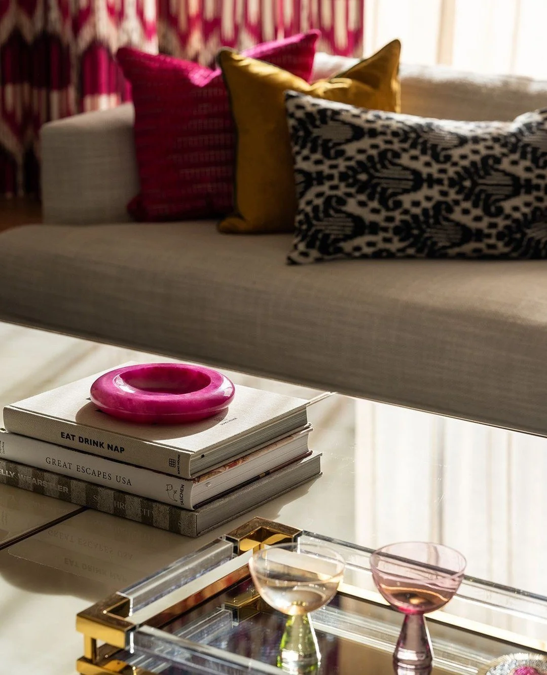 A room with this many textures was never going to be quiet 😉 Velvet, pattern play, glossy finishes, and a little jewel-tone drama make this space feel layered, loungy, and just the right amount of extra 🩷 #EmilyLaMarqueDesign⁠
⁠
Photography by @_ka