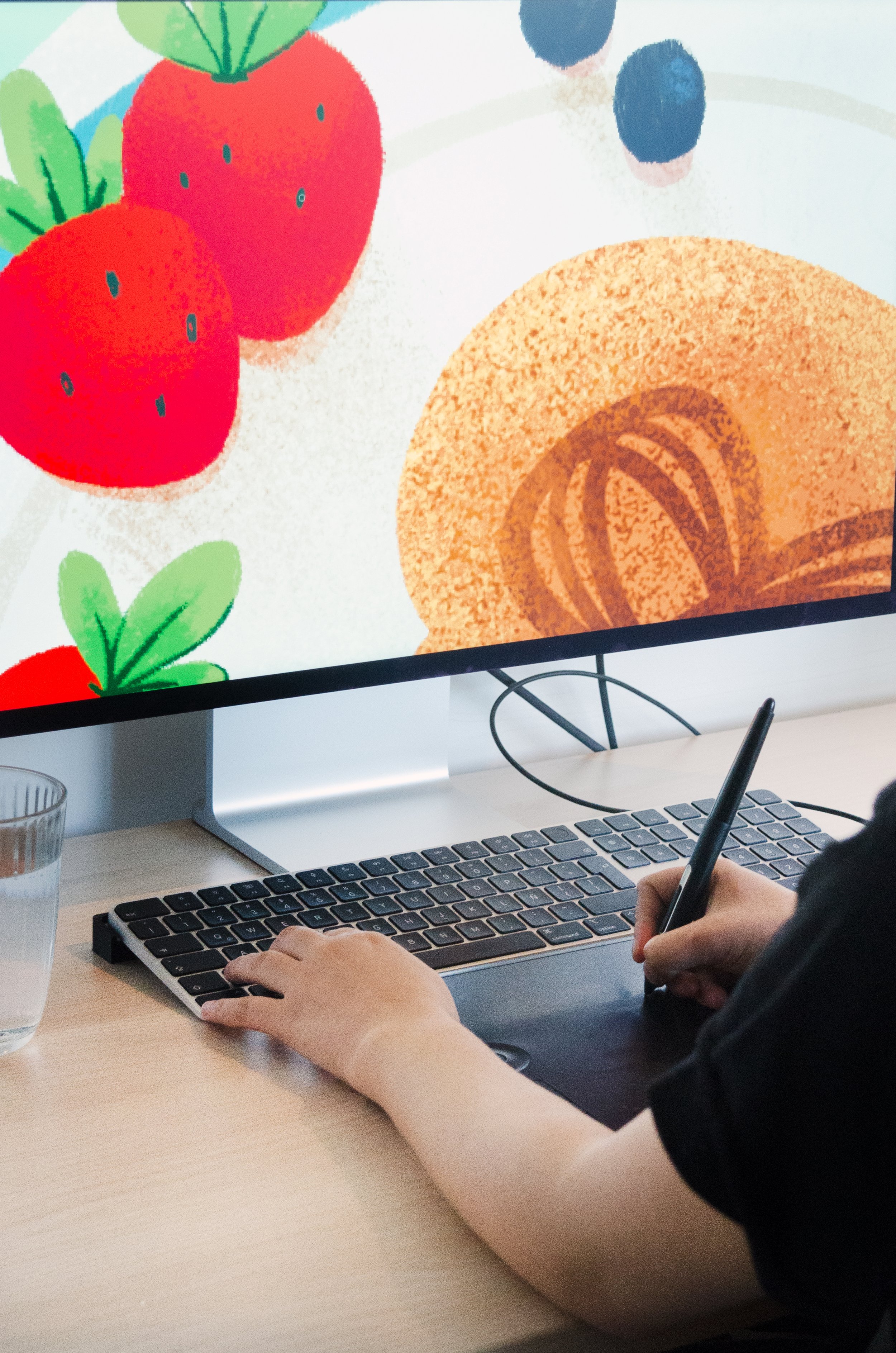 picture of artist working on the design