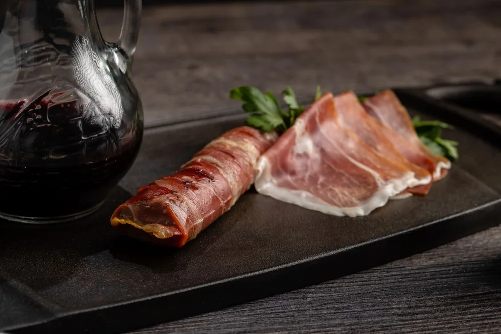 Prosciutto Wrapped Venison Backstrap with Morel Mushroom Sauce — Wild