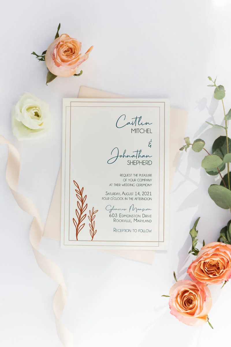 Garden Chic Collection suite invitation with a rust and teal color palette and cream envelope