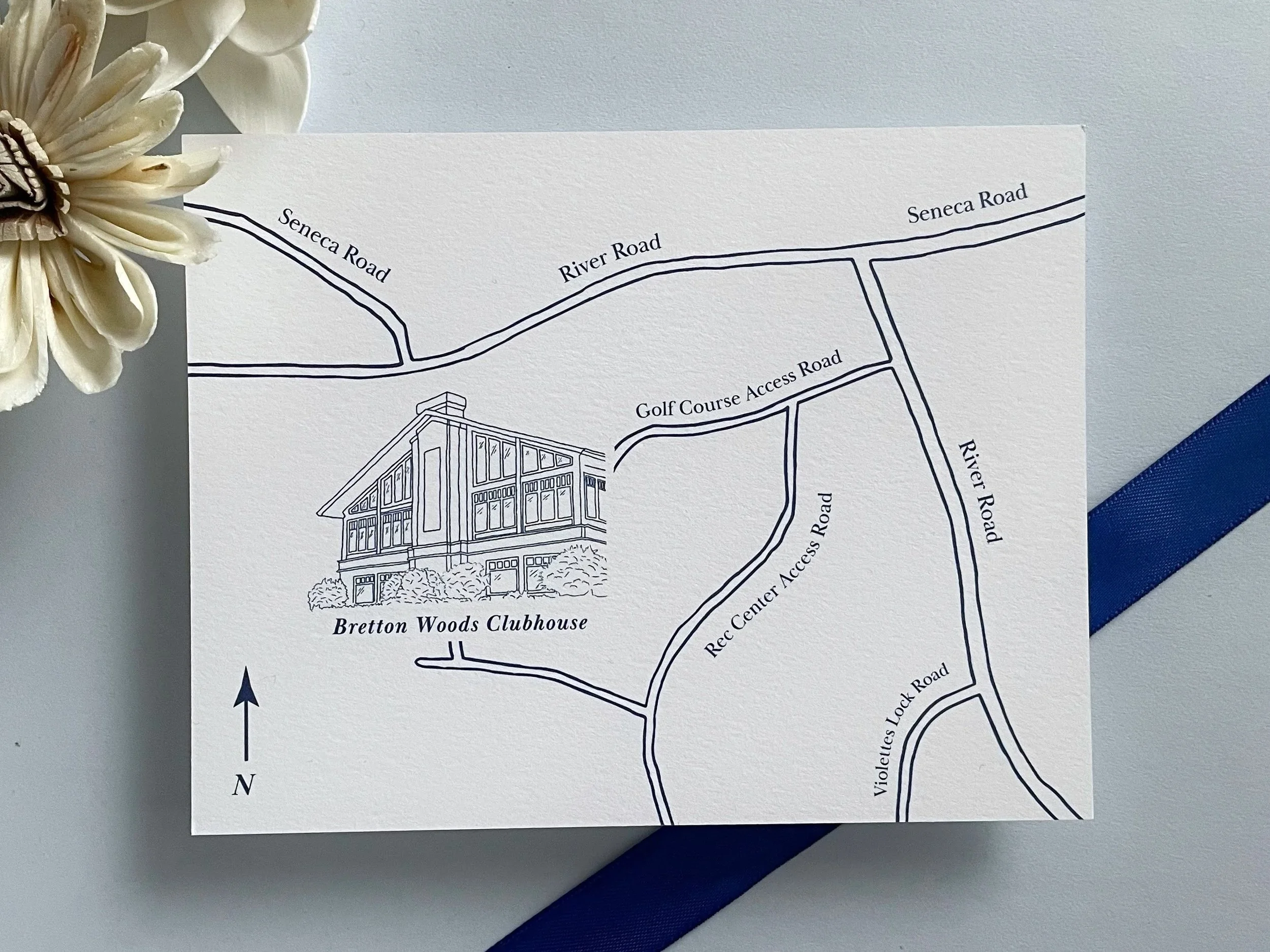 Illustrated venue on a map enclosure card