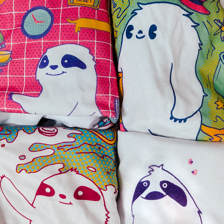 Folded printed T-shirts with illustrated designs