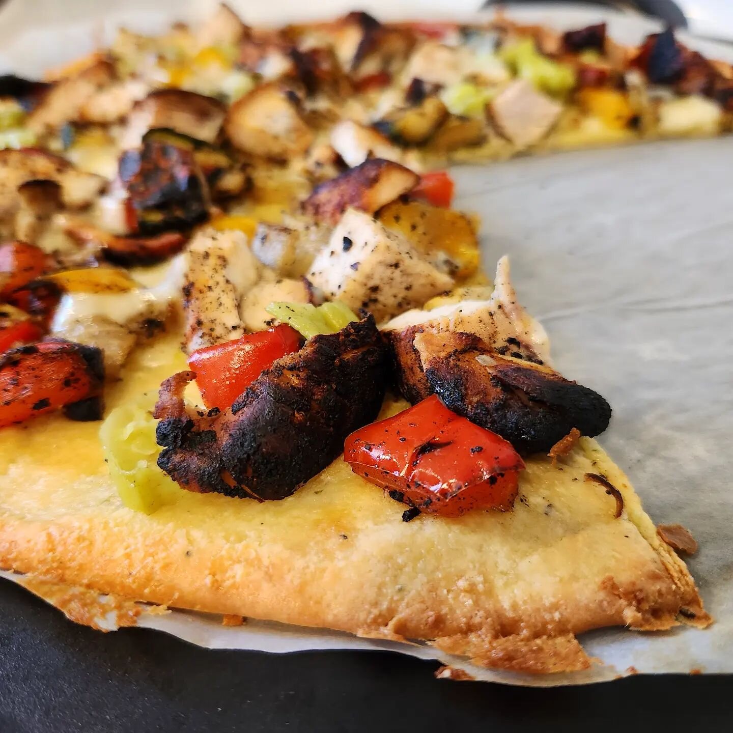 Leftover charcoal grilled chicken and veg, chopped and tossed with peperoncinis, served up on a fathead dough 🤤 Sooooo good!

#lovinitketo #keto #lowcarb #lchf #pizza #ketopizza #grainfree #fatheadpizza #fathead #charcoal