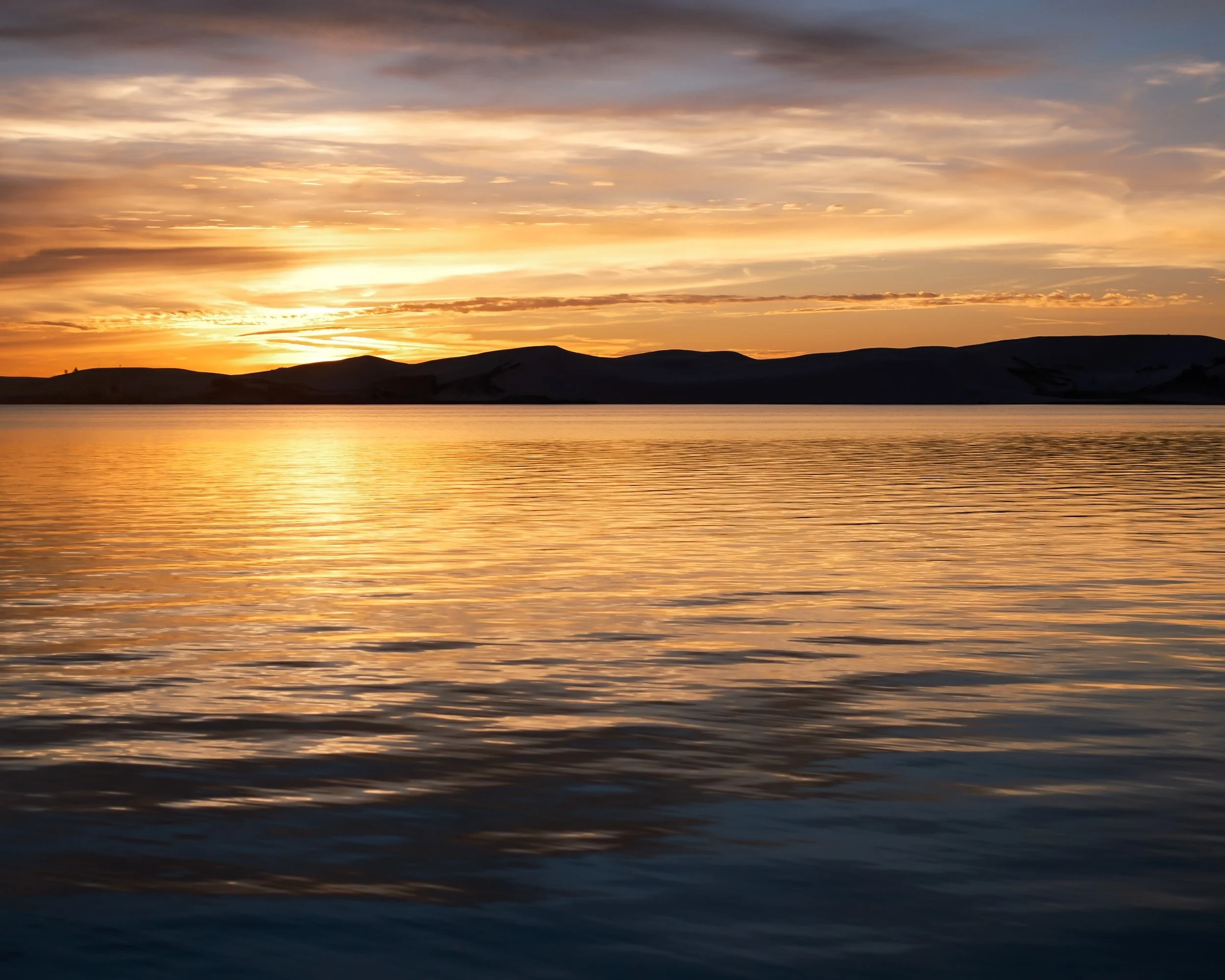 As we drove away from the dunes, we paused for the last light across the lake.
