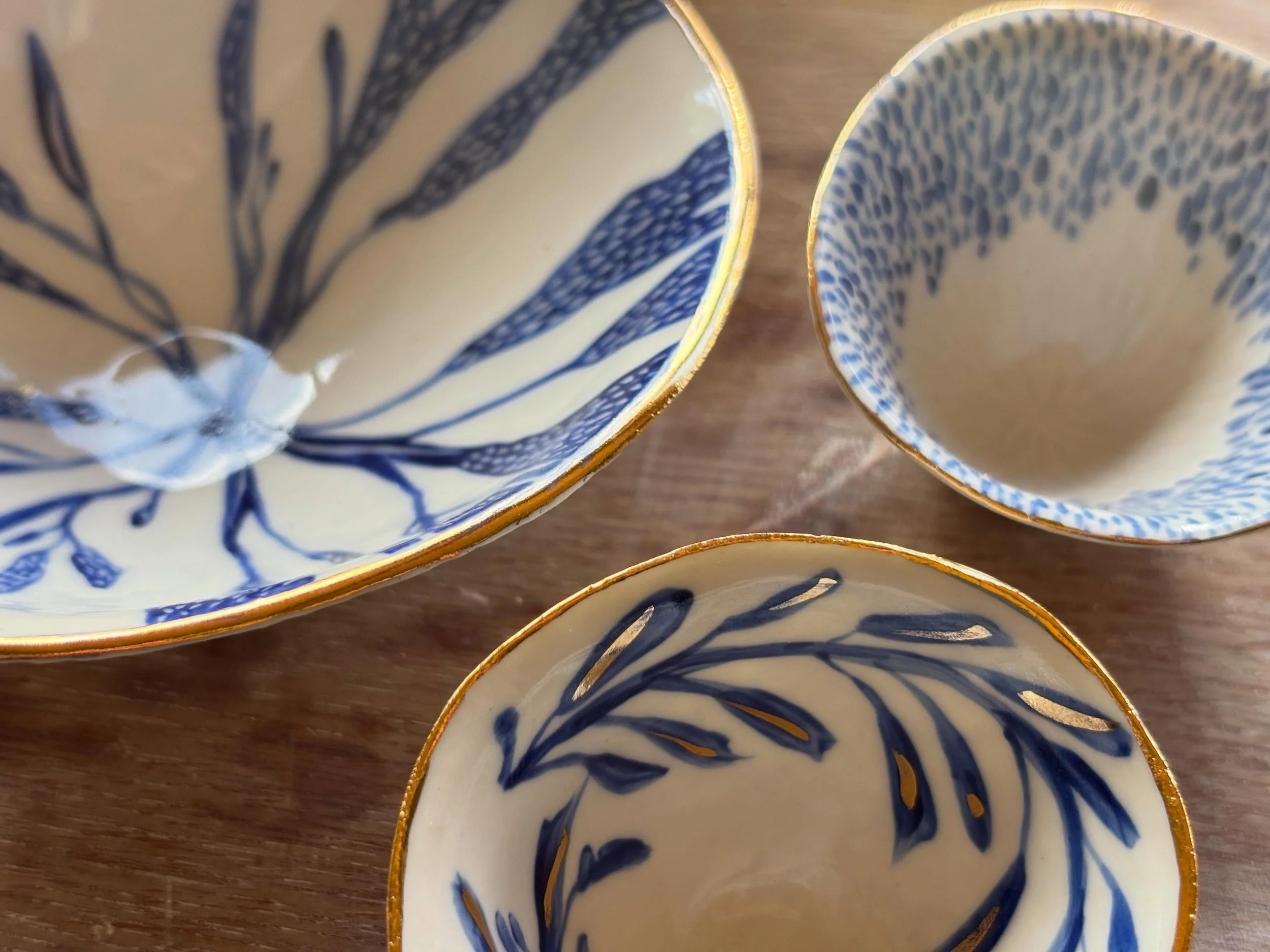 So I&rsquo;ve been developing these over the last few weeks, porcelain slipcast bowls decorated with blue and gold seaweed designs 💙 still warm from the kiln 🌟 #porcelain #contemporaryceramics #welshartist #seaweed #craft