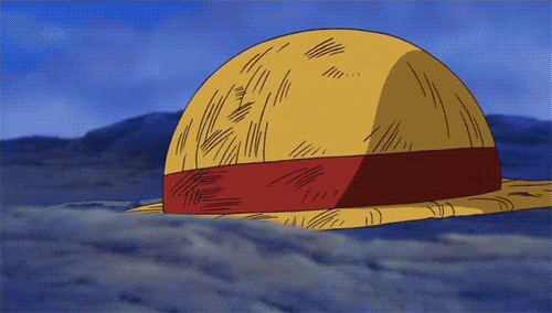 Luffy's Iconic Straw Hat in the Sand